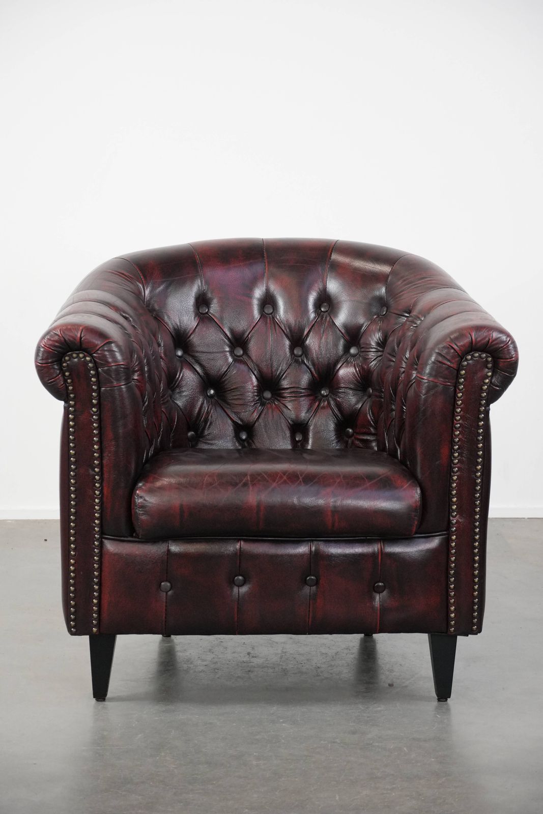 Cowhide Chesterfield Club Armchair In Classic English Style, Finished With Decorative Studs photo furniture