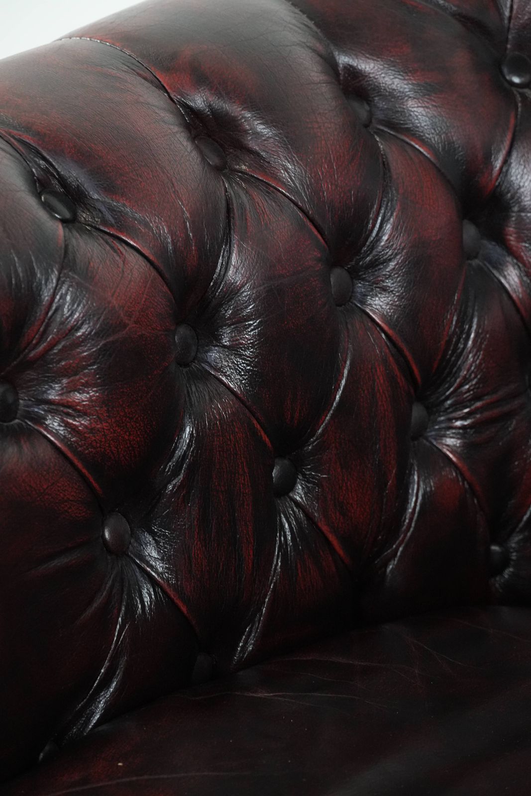 photo buy Cowhide Chesterfield Club Armchair In Classic English Style, Finished With Decorative Studs