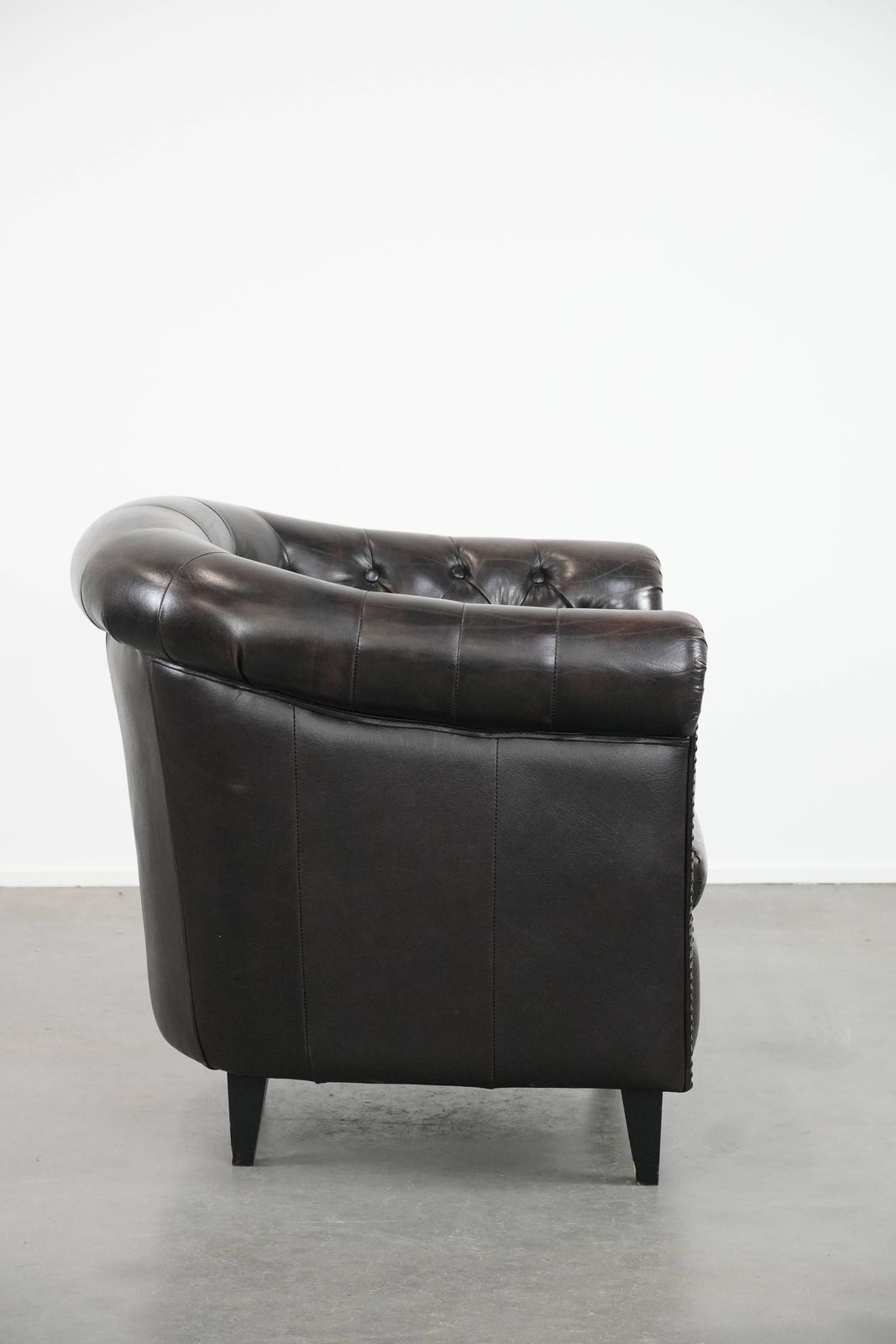 Dark Luxurious Cowhide Chesterfield Club Armchair In English Style, Finished With Decorative Nails photo for sale