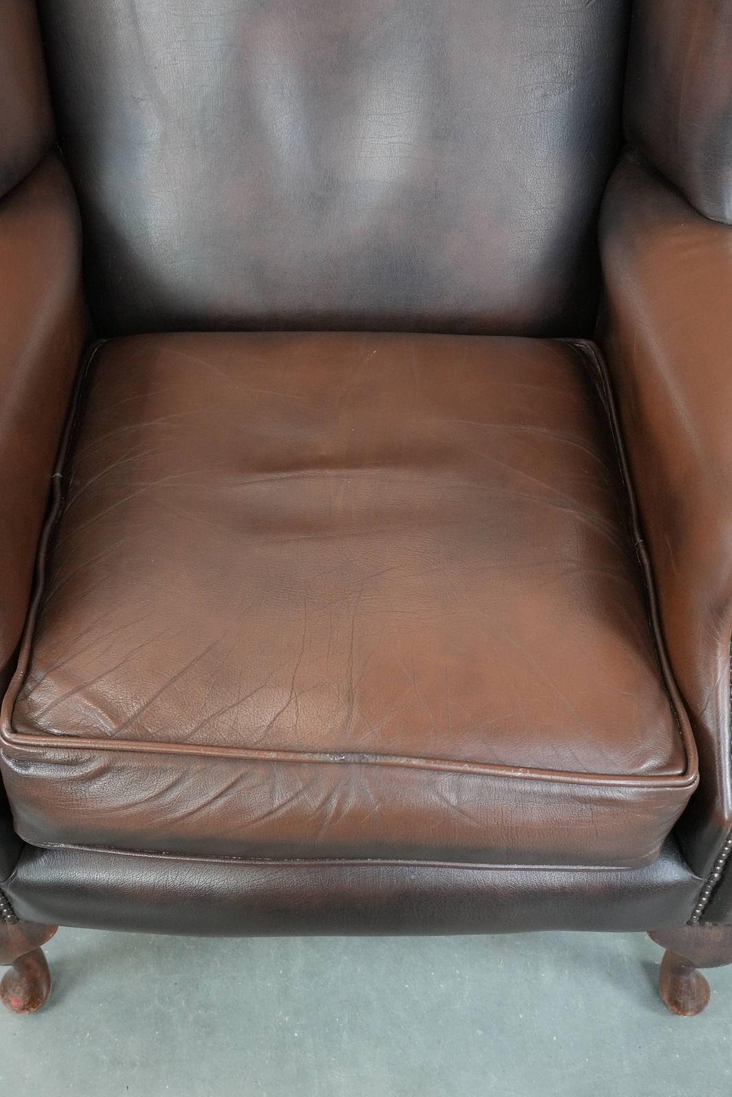 Nice Brown Smooth Cowhide Chesterfield Armchair In English Style Finished With Decorative Nails photo vinterior