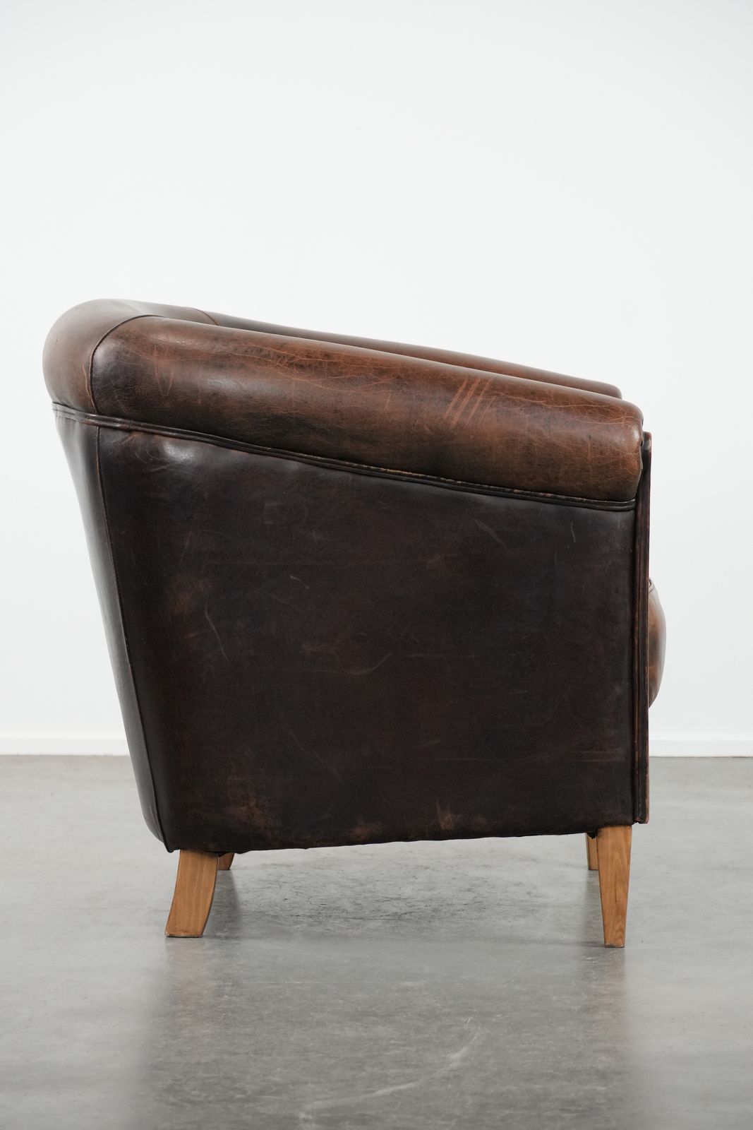 Characterful Club Armchair Made Of Sheepskin With A Beautiful Patina And Comfortable Seating photo for sale