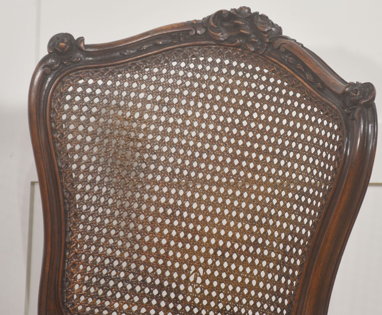Pair Of Louis XV Style Carved Walnut And Caned Side Chairs photo vinterior