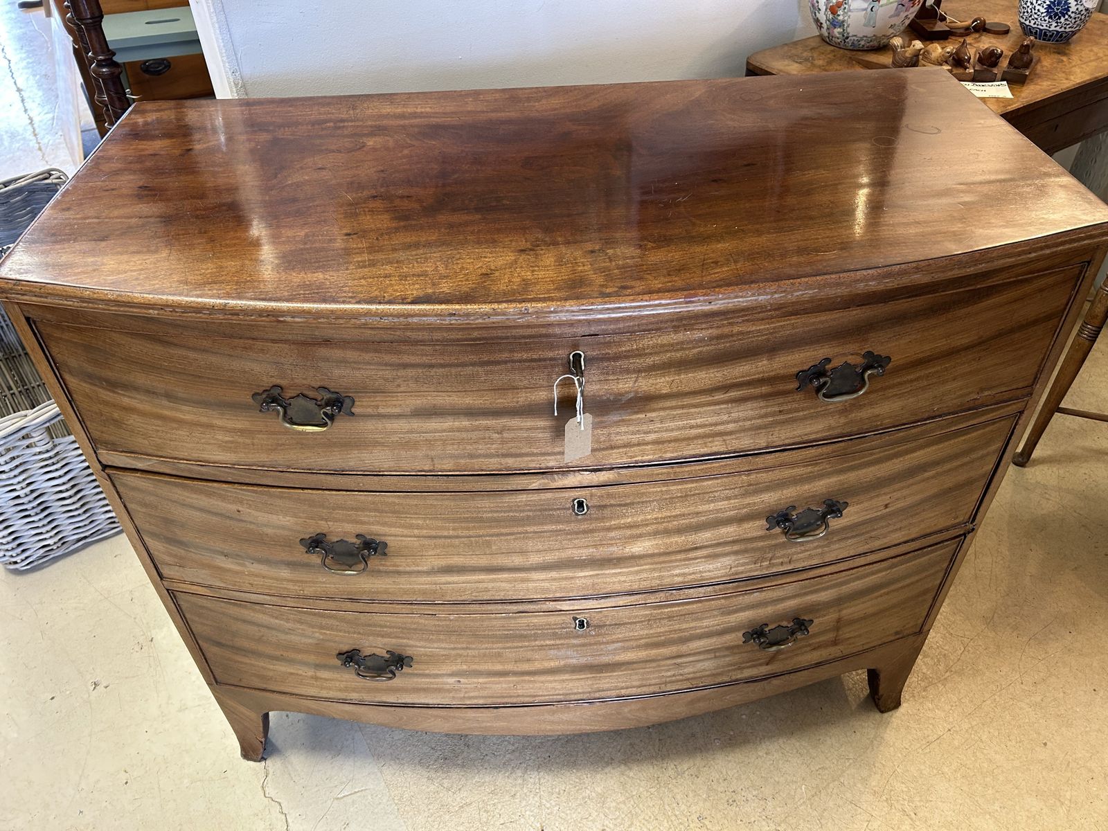 645.0 Antique Mahogany Bow Front Chest Of Drawers   With Working Key photo