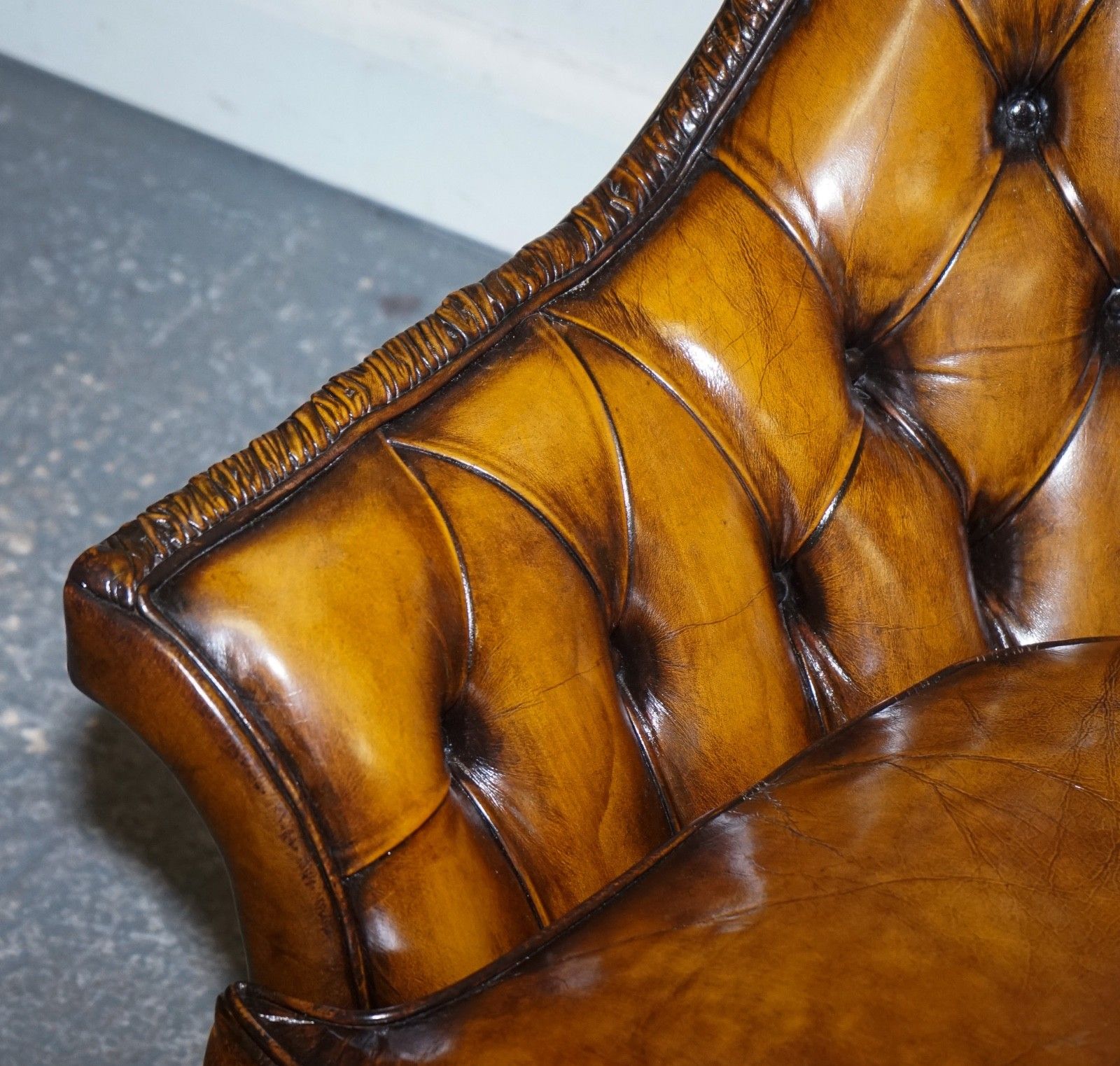 photo for sale Rare Pair Of Brown Hand Dyed Leather Chesterfield Armchairs With Pleated Front