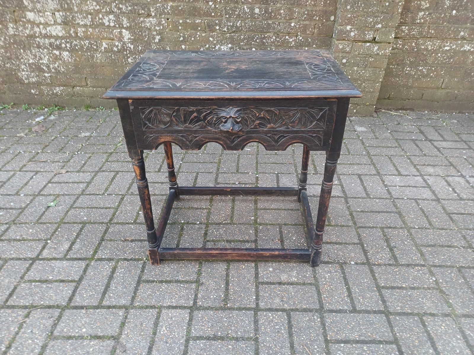 Antique C1910–1920 Solid Oak Pussyfoot Side Table – Carved Top, Gothic Detail, Turned Legs, Distressed Original Finish