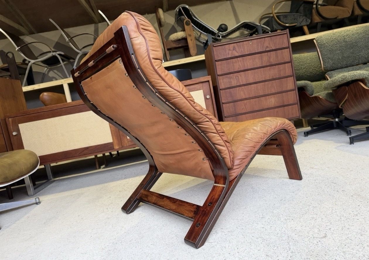 885.0 Mid Century Norwegian Tan Leather Lounge Chair By Oddvin Rykken photo