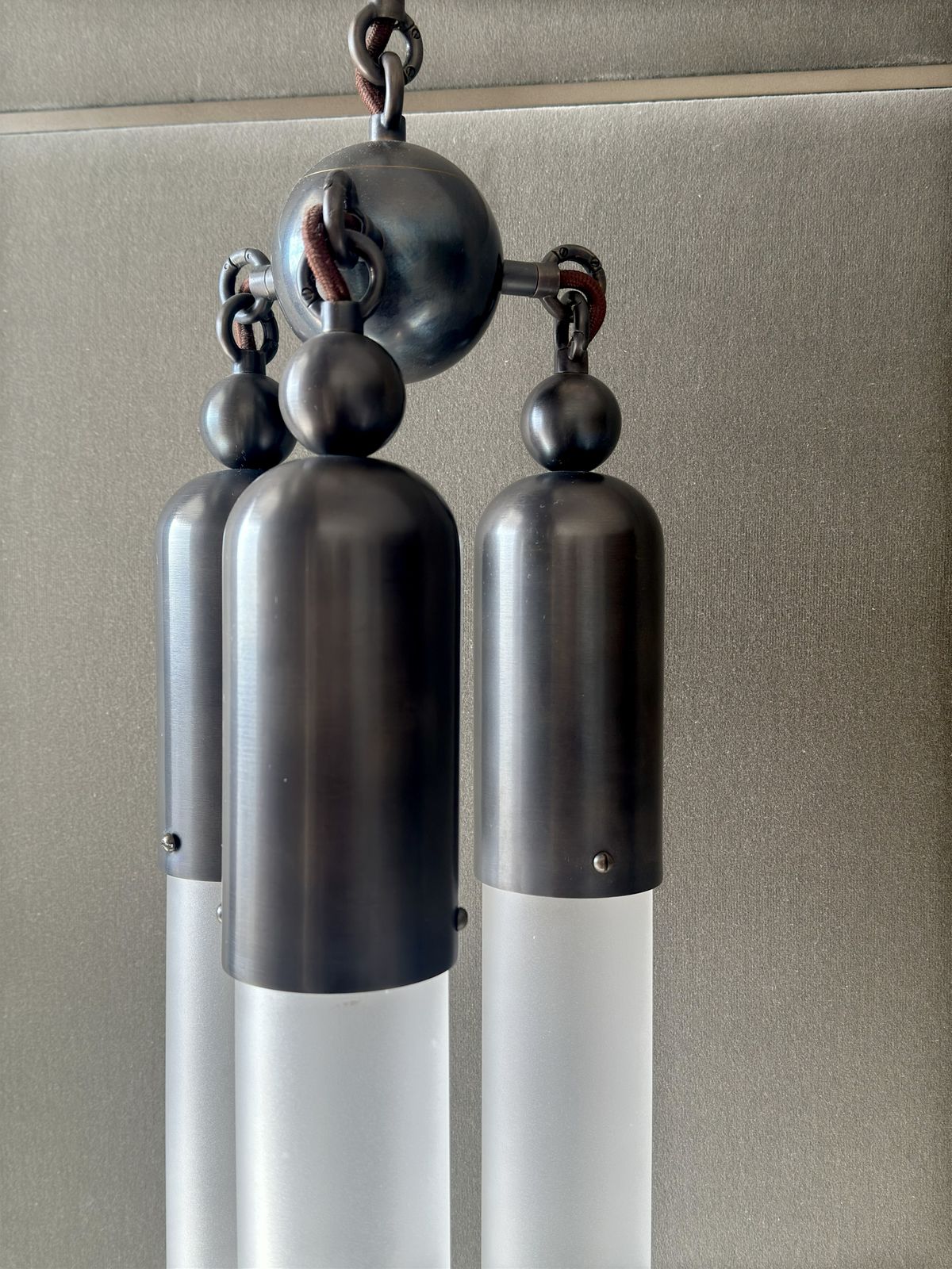 Pair Of Tassel 3 Bronze Pendant Lights By Apparatus Studio photo vintage