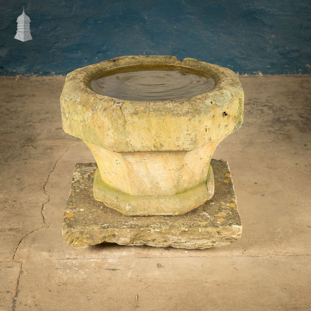 photo vintage Octagonal Sandstone Font Of Significant Age.