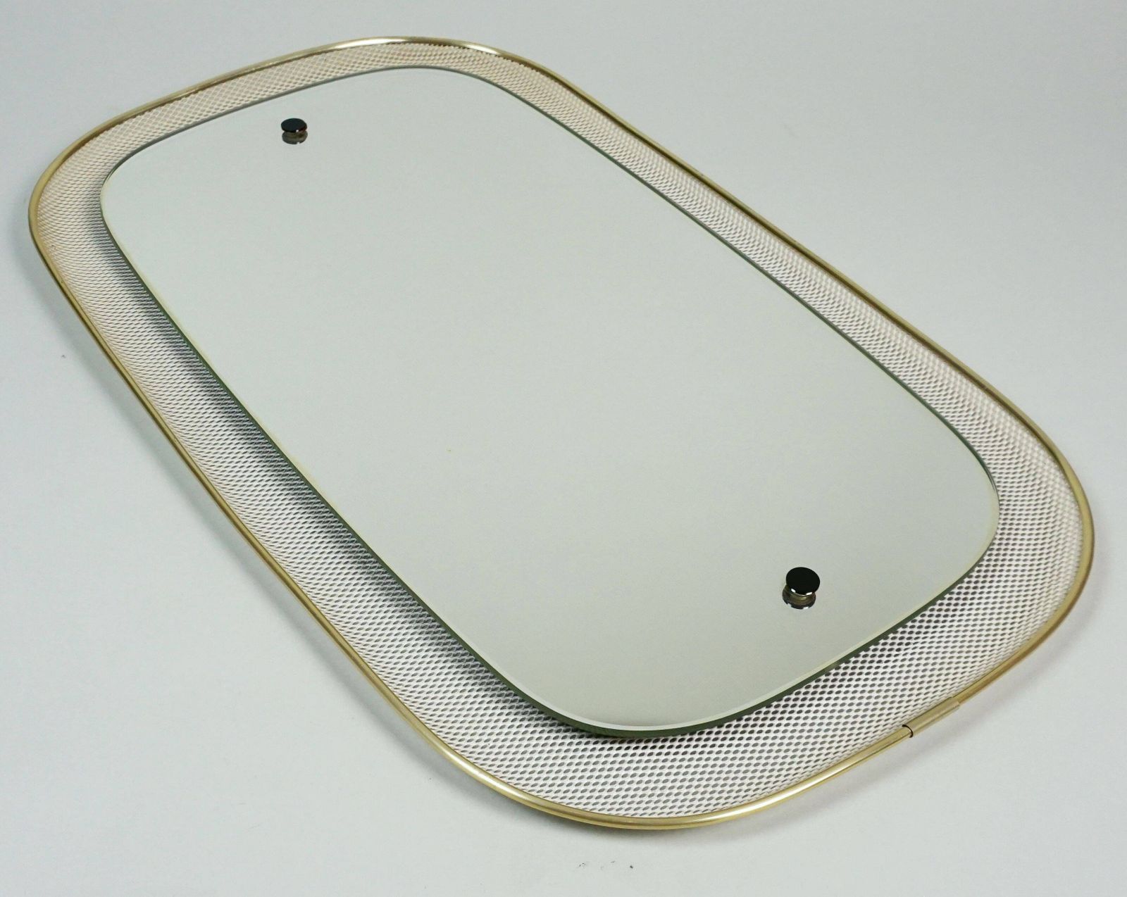 Home Decor Beautiful 1950s Wall Mirror In Mid Century Modern Style With A Metal Mesh And Brass Frame photo