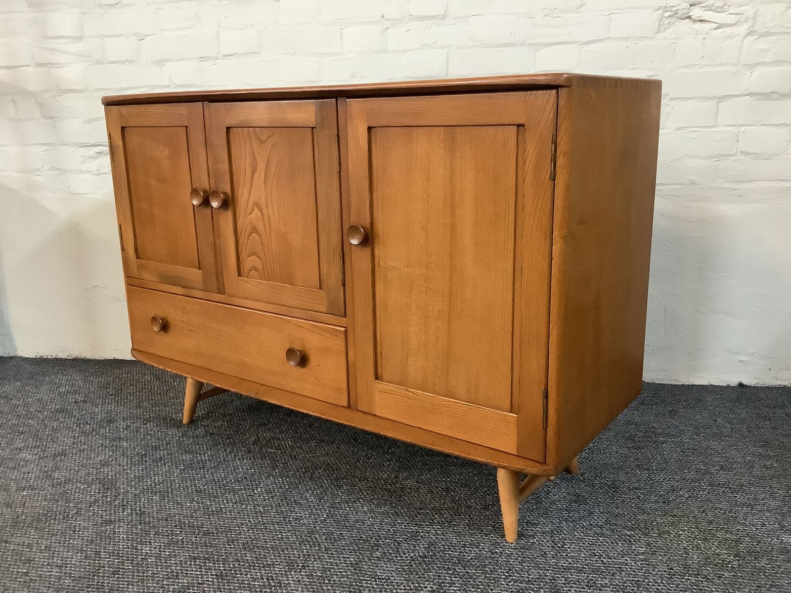 photo furniture Ercol Windsor 366 Sideboard In Original Natural Elm Finish.