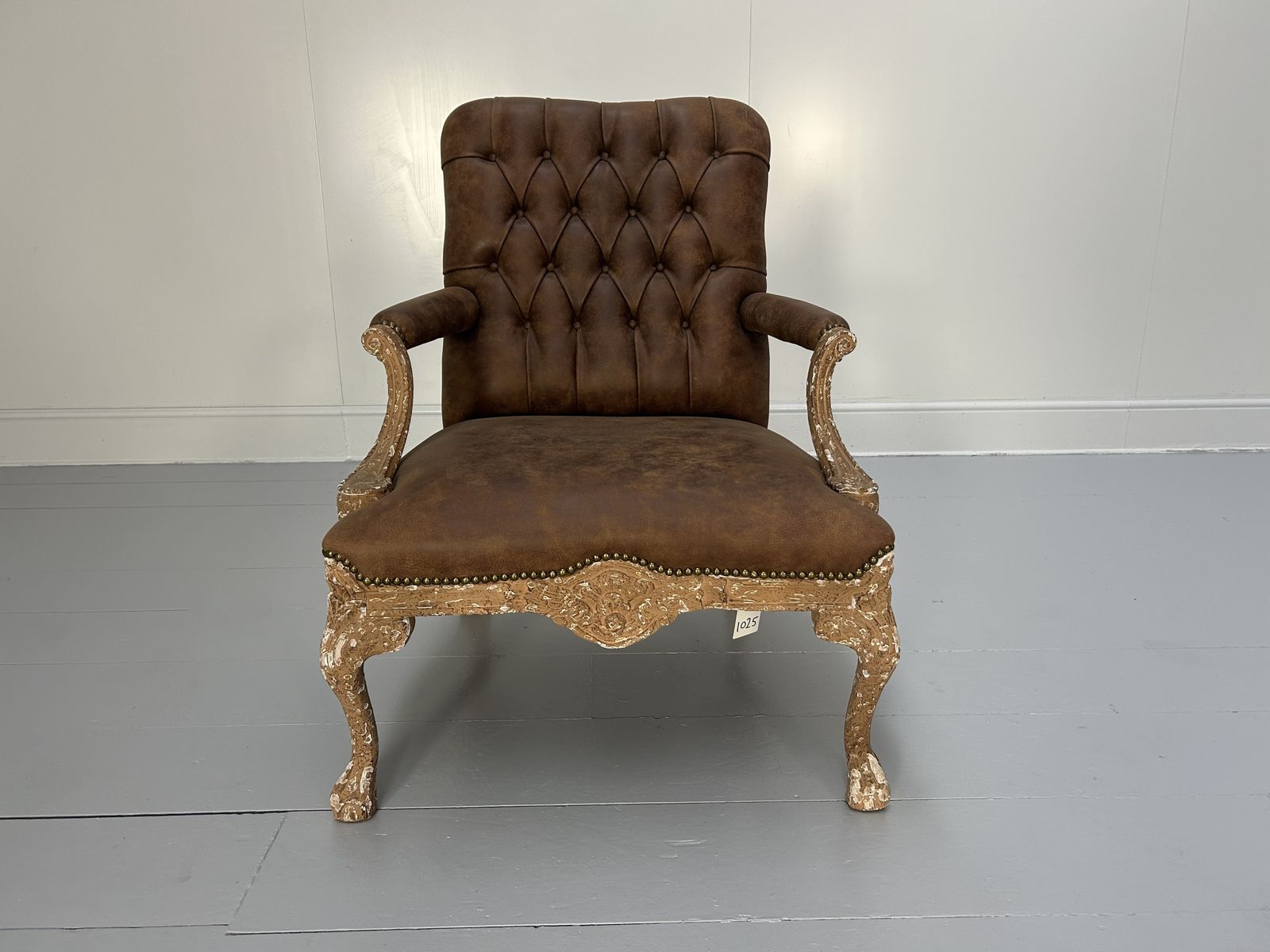 Andrew Martin Buttoned Back Armchair And Stool In Antiqued Brown Leather photo for sale