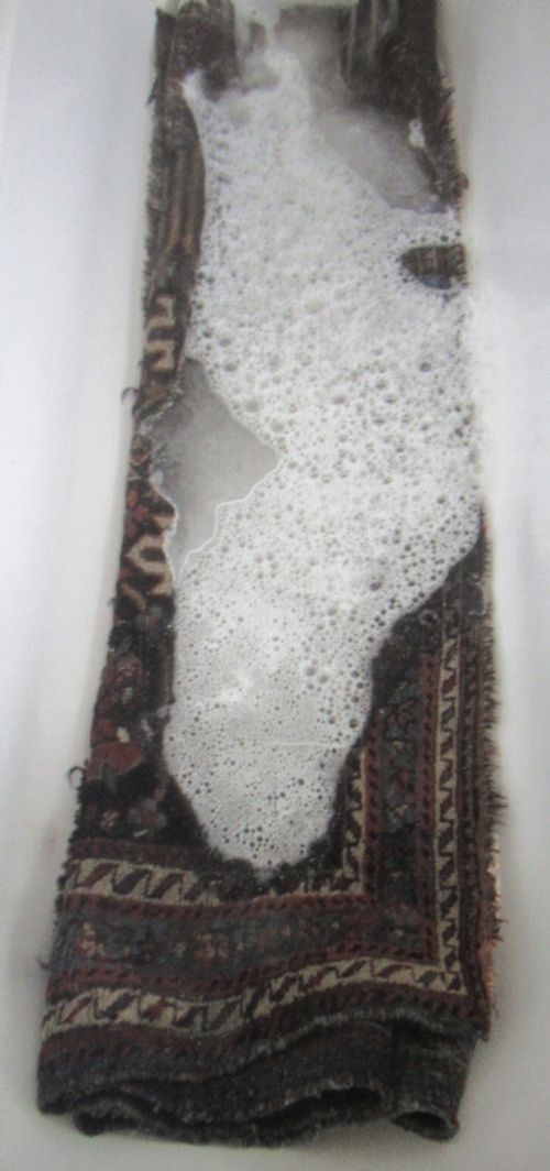 photo vintage Distressed Antique Kurdish Rug. 173cm X 137cm.