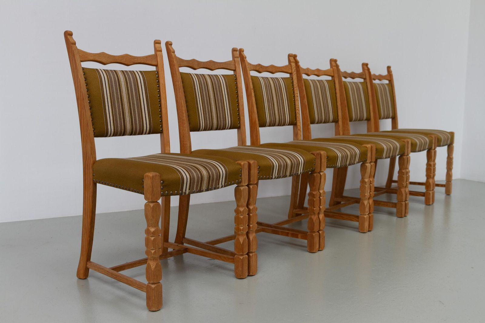 1555.0 Danish Brutalist Oak Dining Chairs By Henning Kjærnulf, 1970s. Set Of 6. photo
