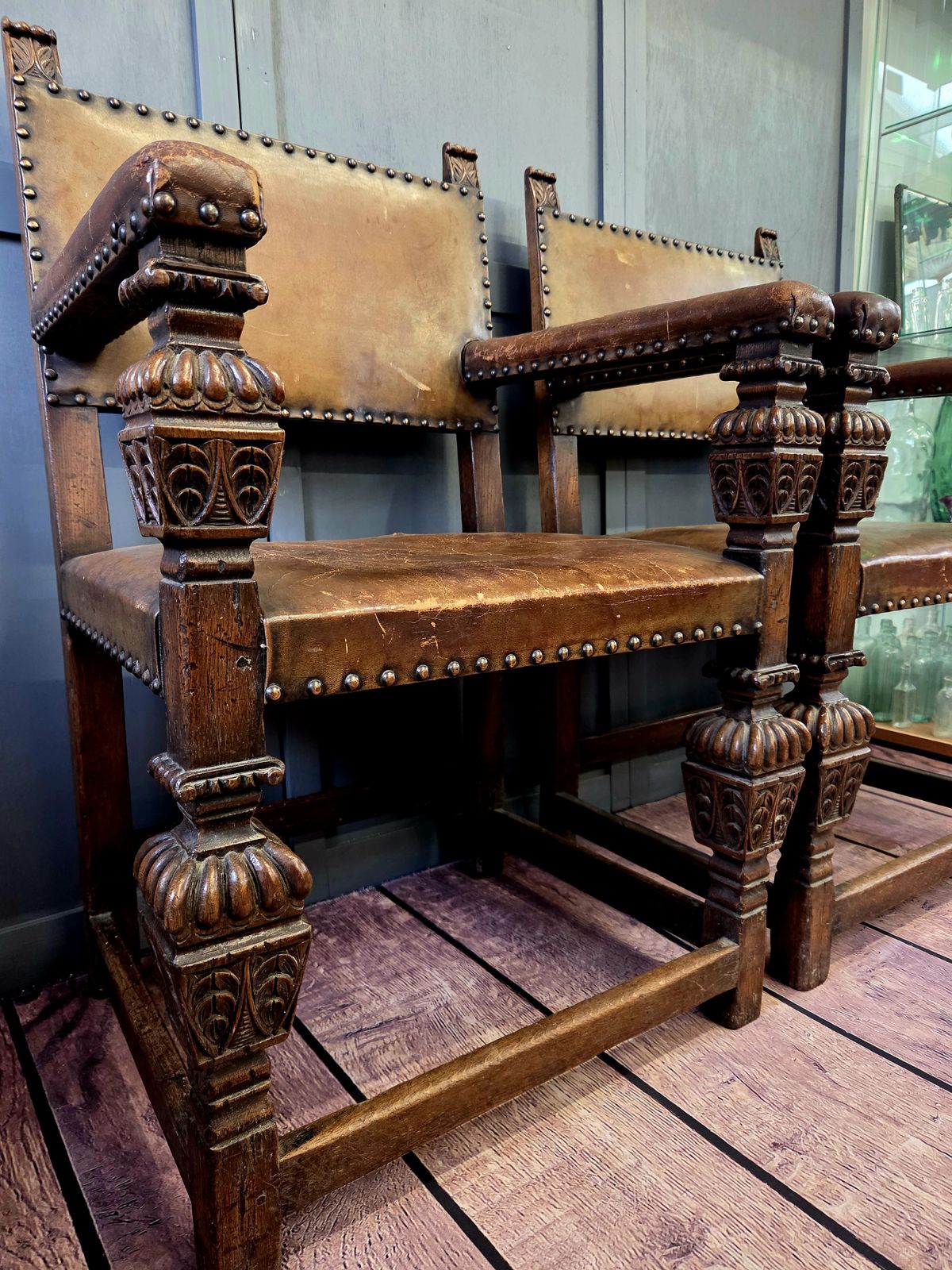 Pair Of Late 19th Century Jacobean Revival Carved Oak Armchairs With Original Studded Leather photo for sale