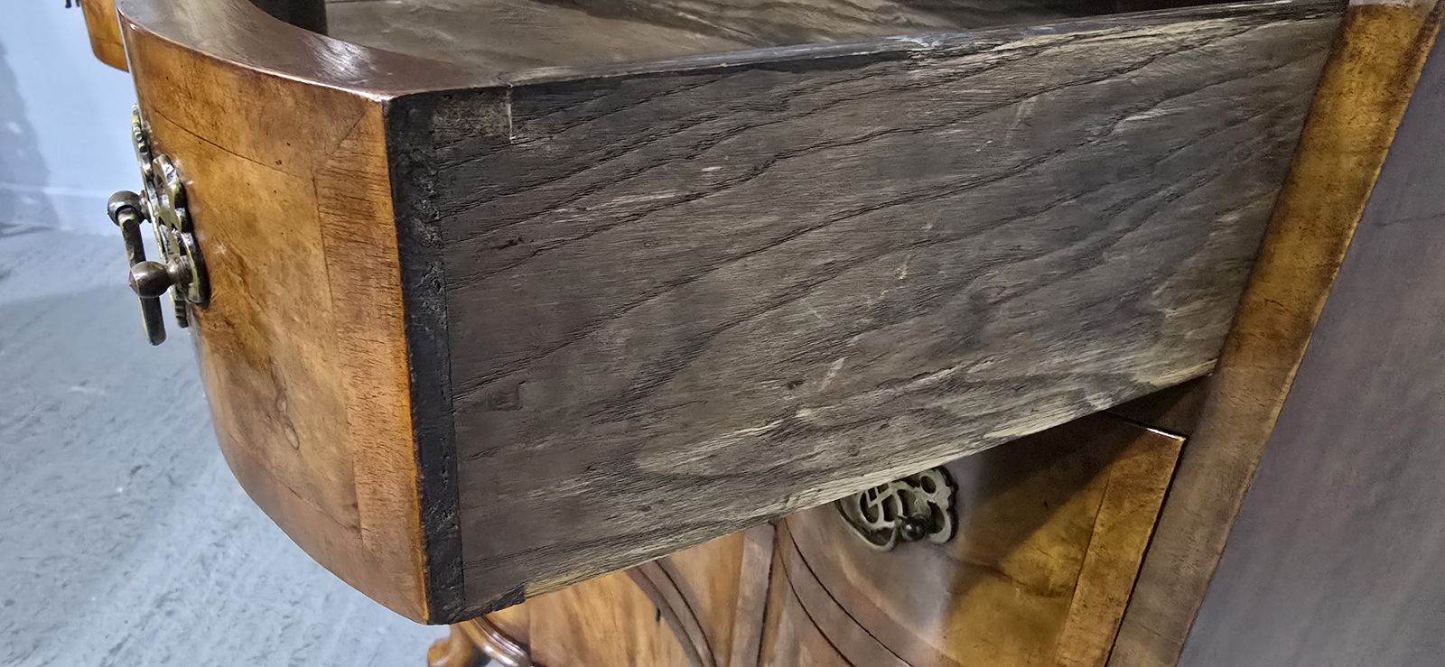 photo furniture Outstanding Concave Walnut Chest Of Drawers