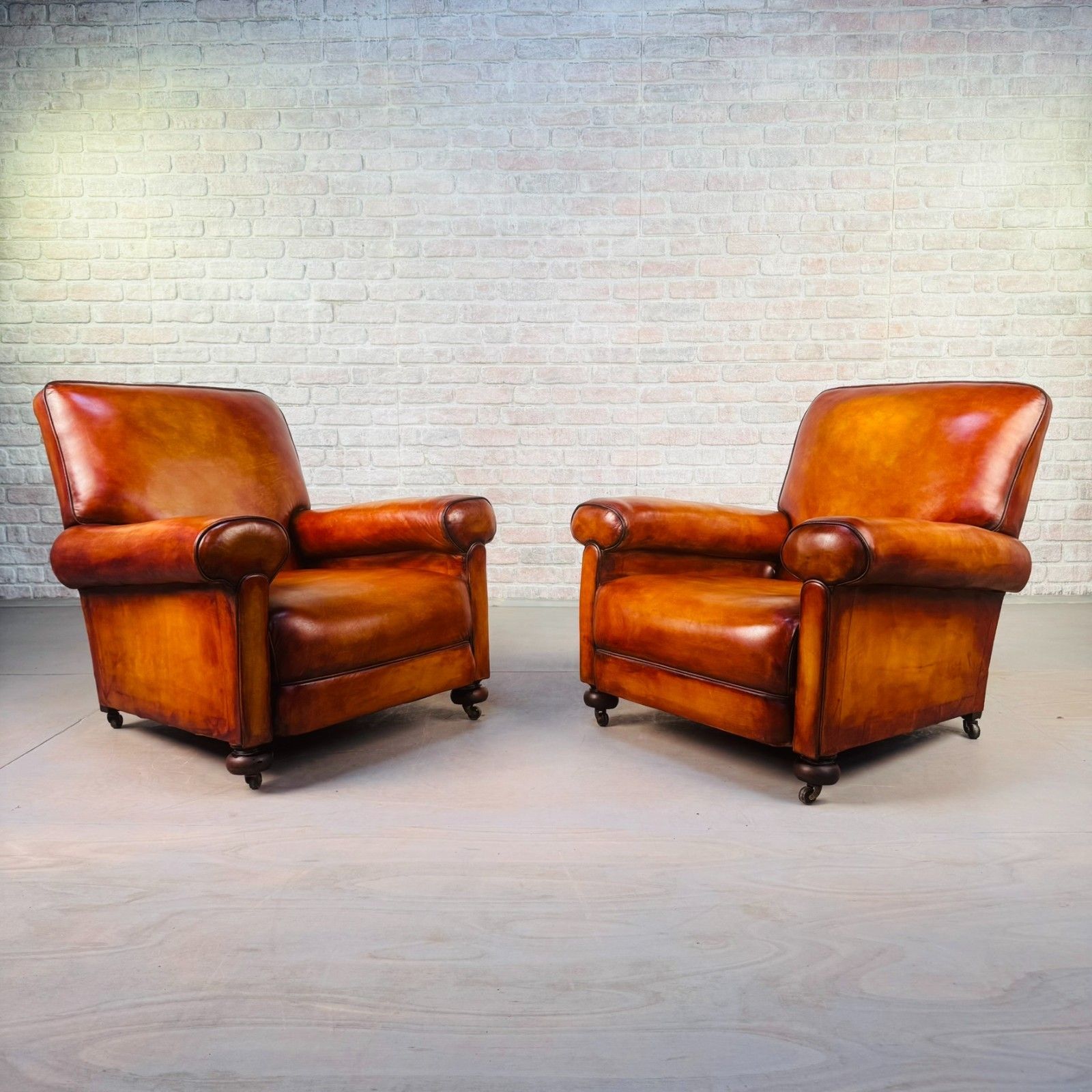 Pair Of 1920s English Tan Leather Club Armchairs
