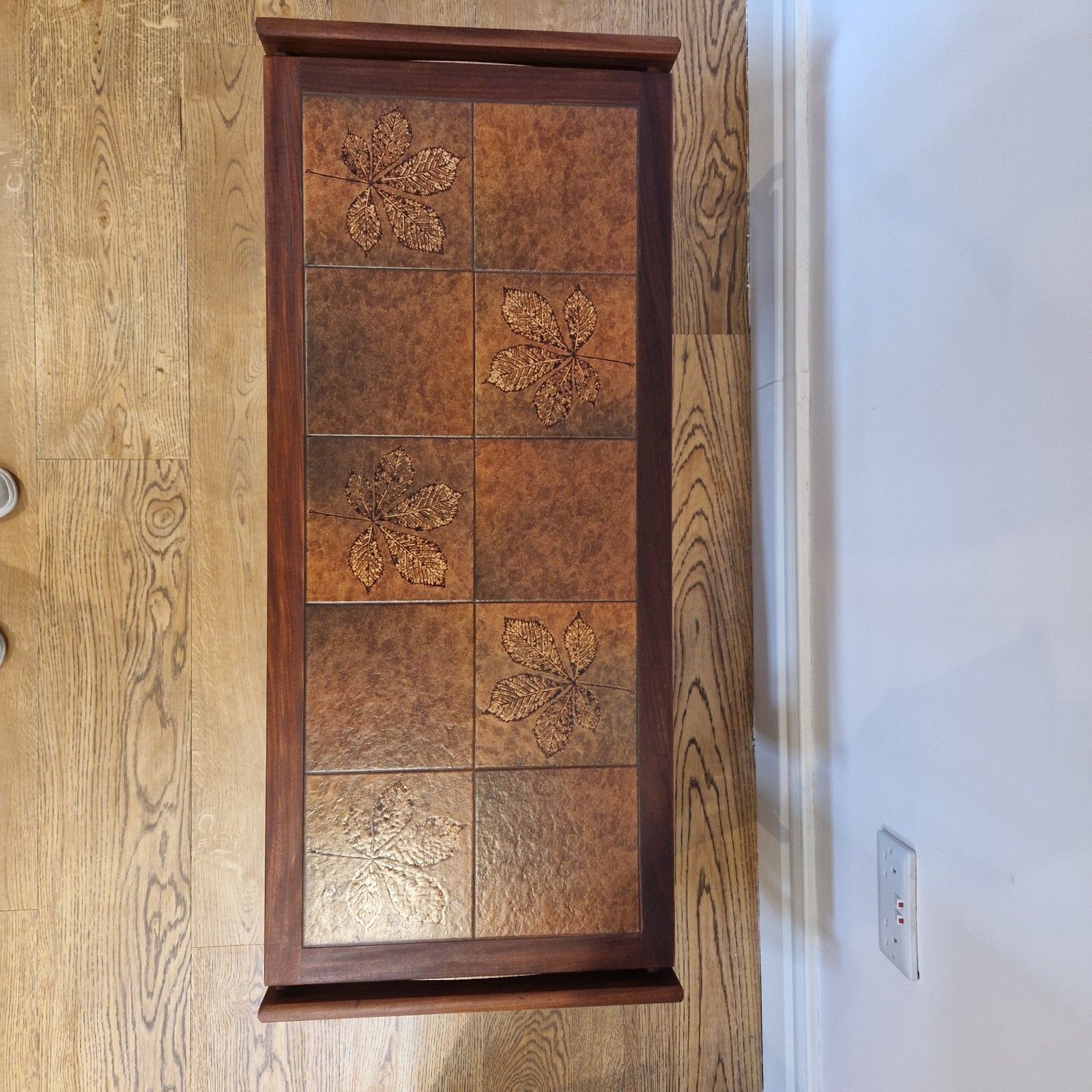 photo furniture Mid Century Solid Teak Coffee Table With Tiled Leaf Design And Slatted Shelf