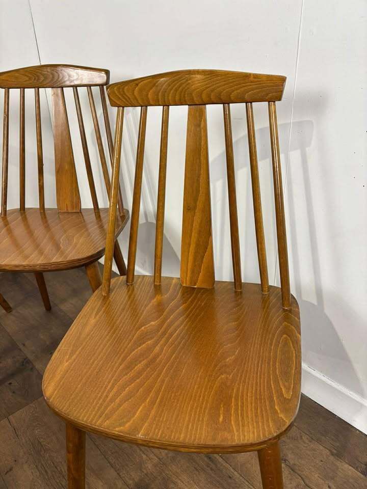Set Of Four Rodanski Mid Century Danish Style Stick Back Dining Chairs photo furniture
