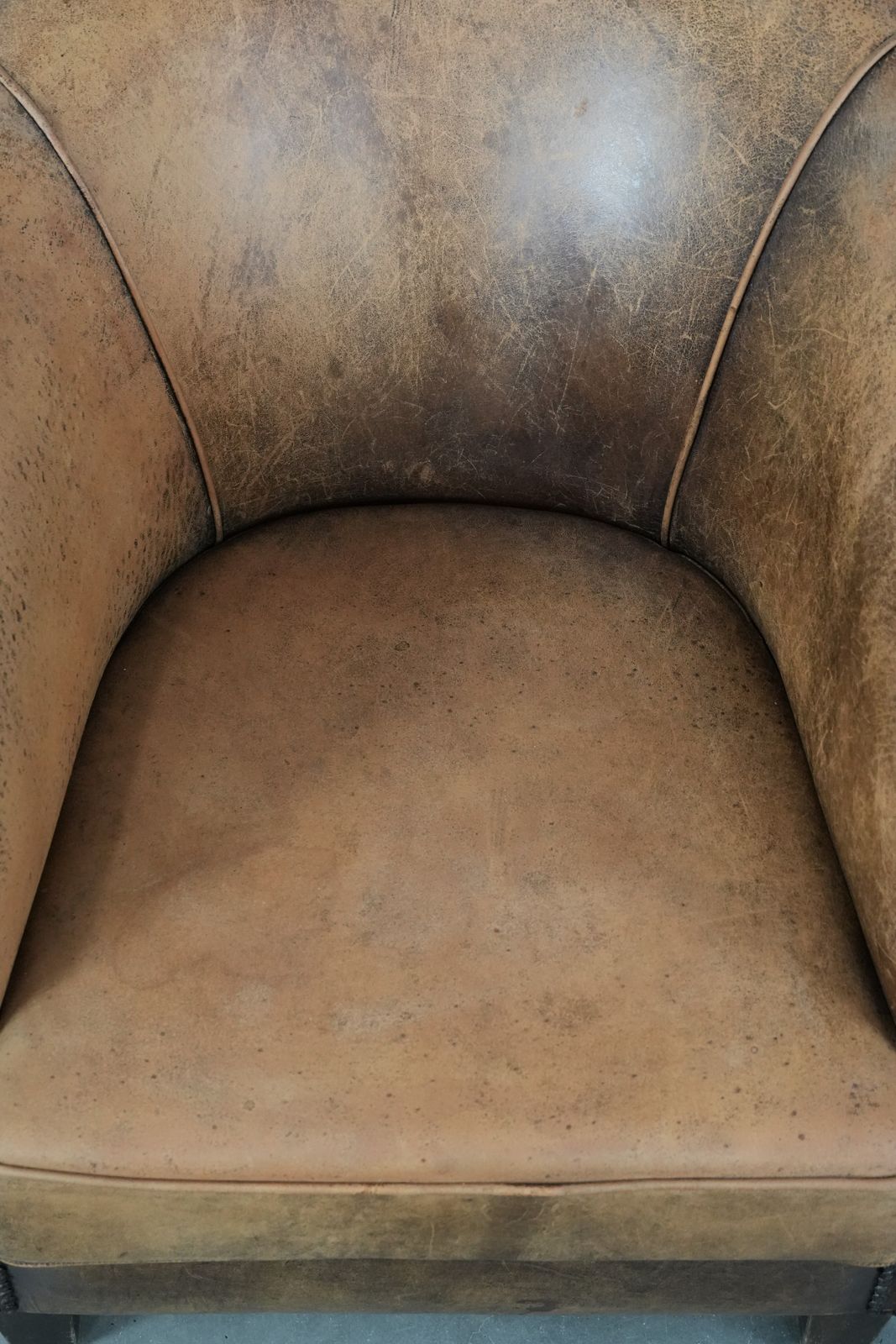 Timeless Vintage Sheep Leather Club Armchair With Character And A Beautiful Patina photo vinterior