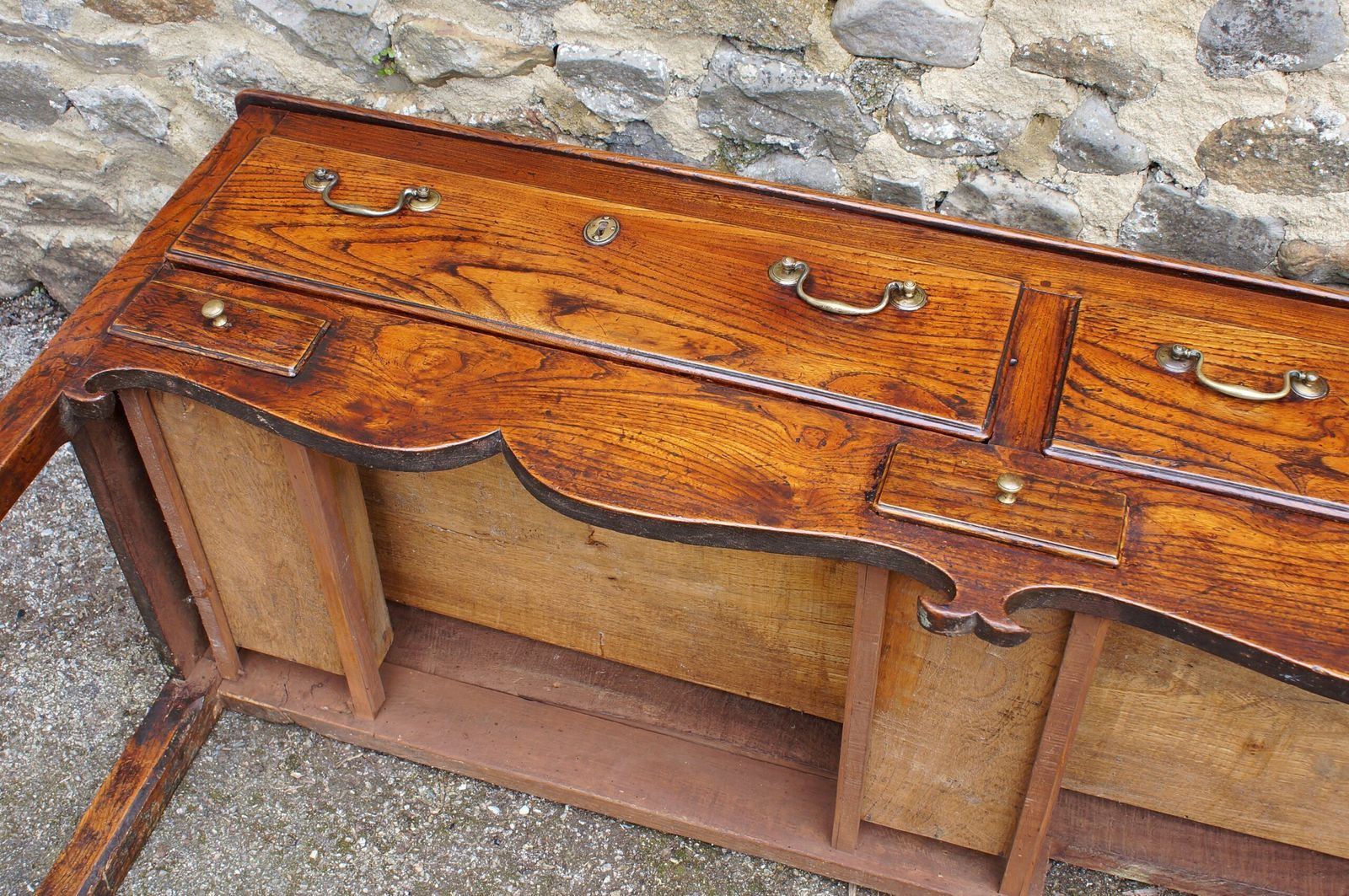 photo buy An Exceptional Elm 18th Century Dresser.