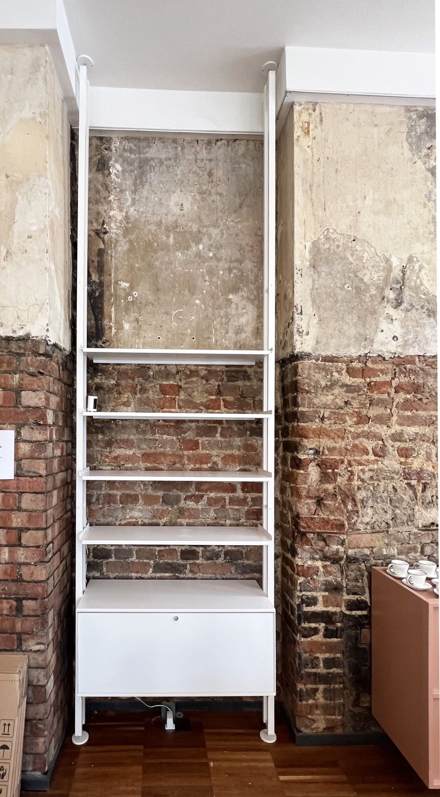 Tension Pole Shelving Unit With Storage