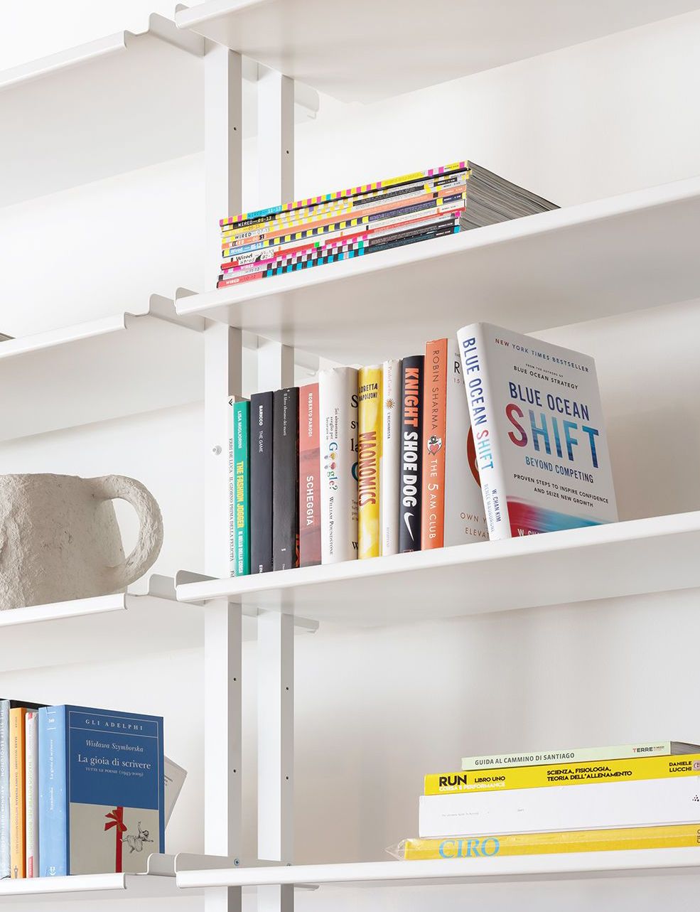 photo furniture Tension Pole Shelving Unit With Storage