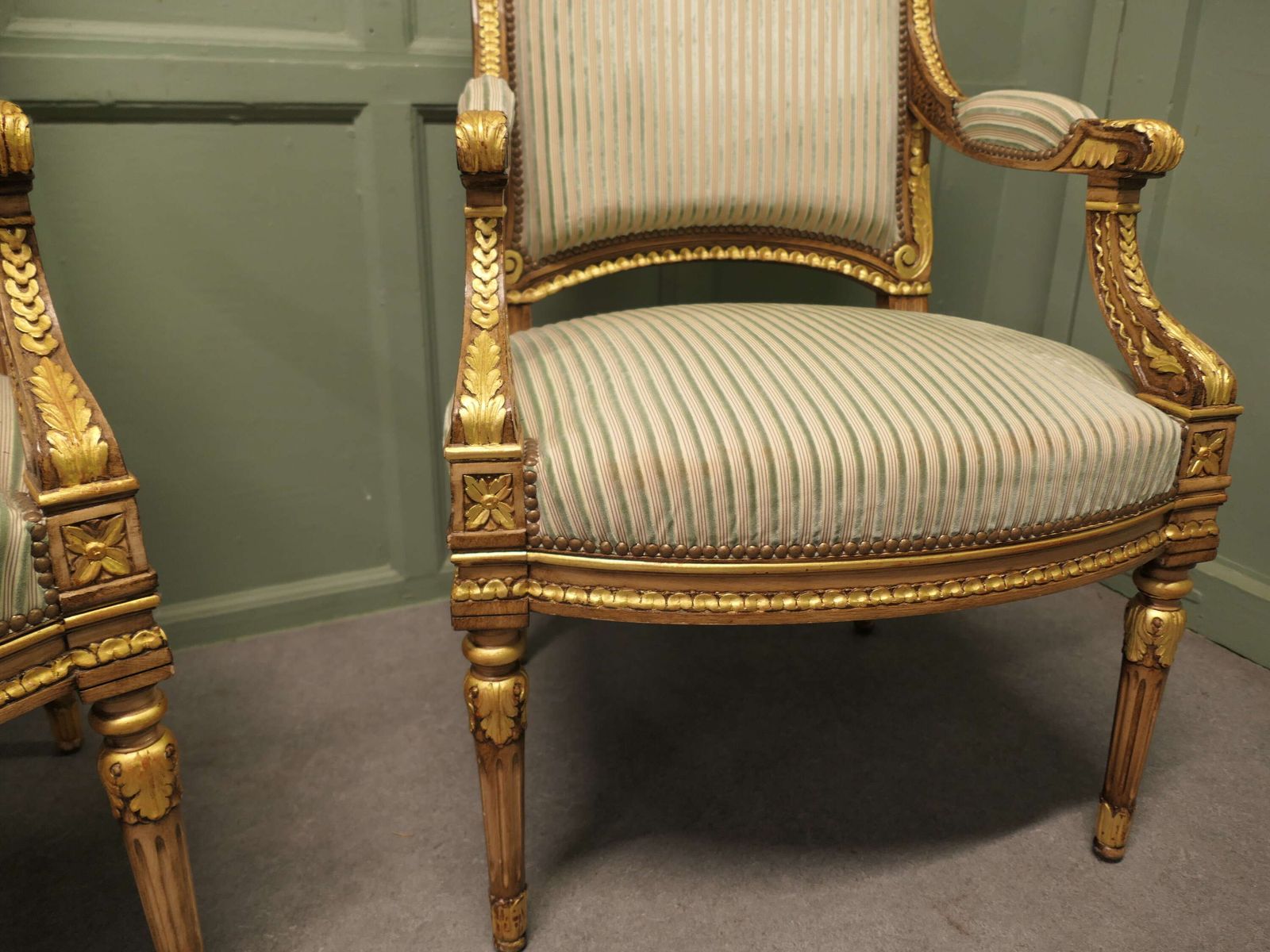 A Pair Of French Regency Style Open Arm Chairs photo for sale