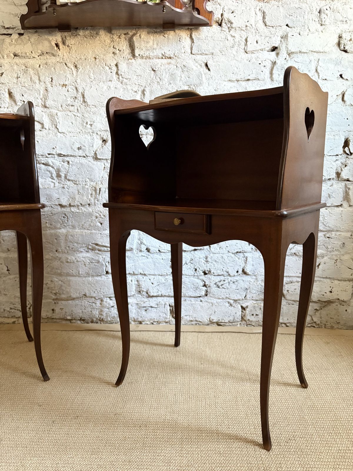 photo vintage A Pair Of French Bedside Tables With Heart Cut Out Detail