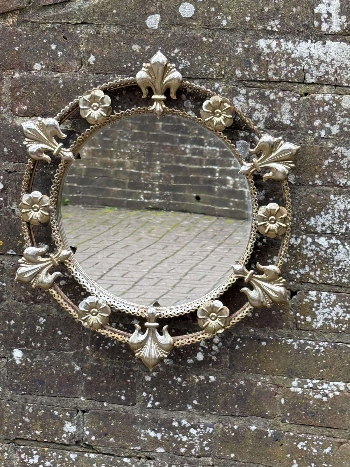 Vintage Ornate Gold Tone Wall Mirror With Floral Fleur De Lis Rustic Rusted And Retro Frame photo for sale