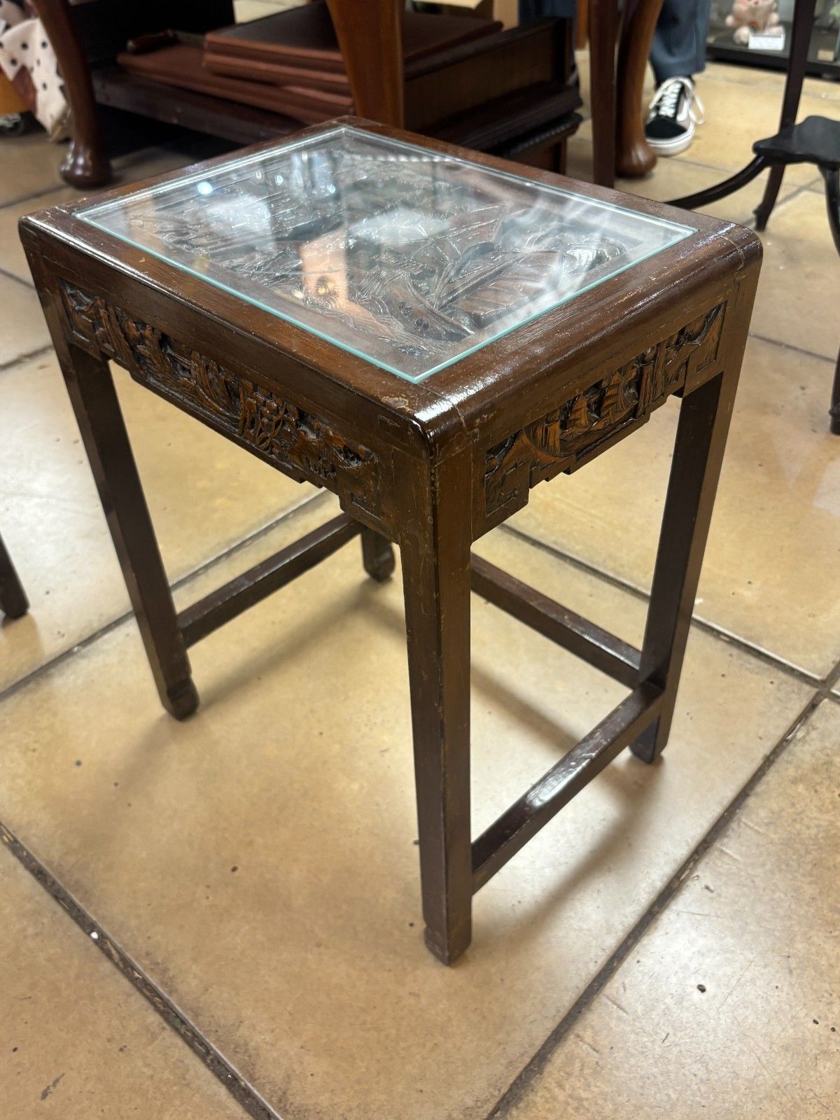 photo furniture Antique Chinese Heavily Carved Four Nest Of Tables With Glass Tops