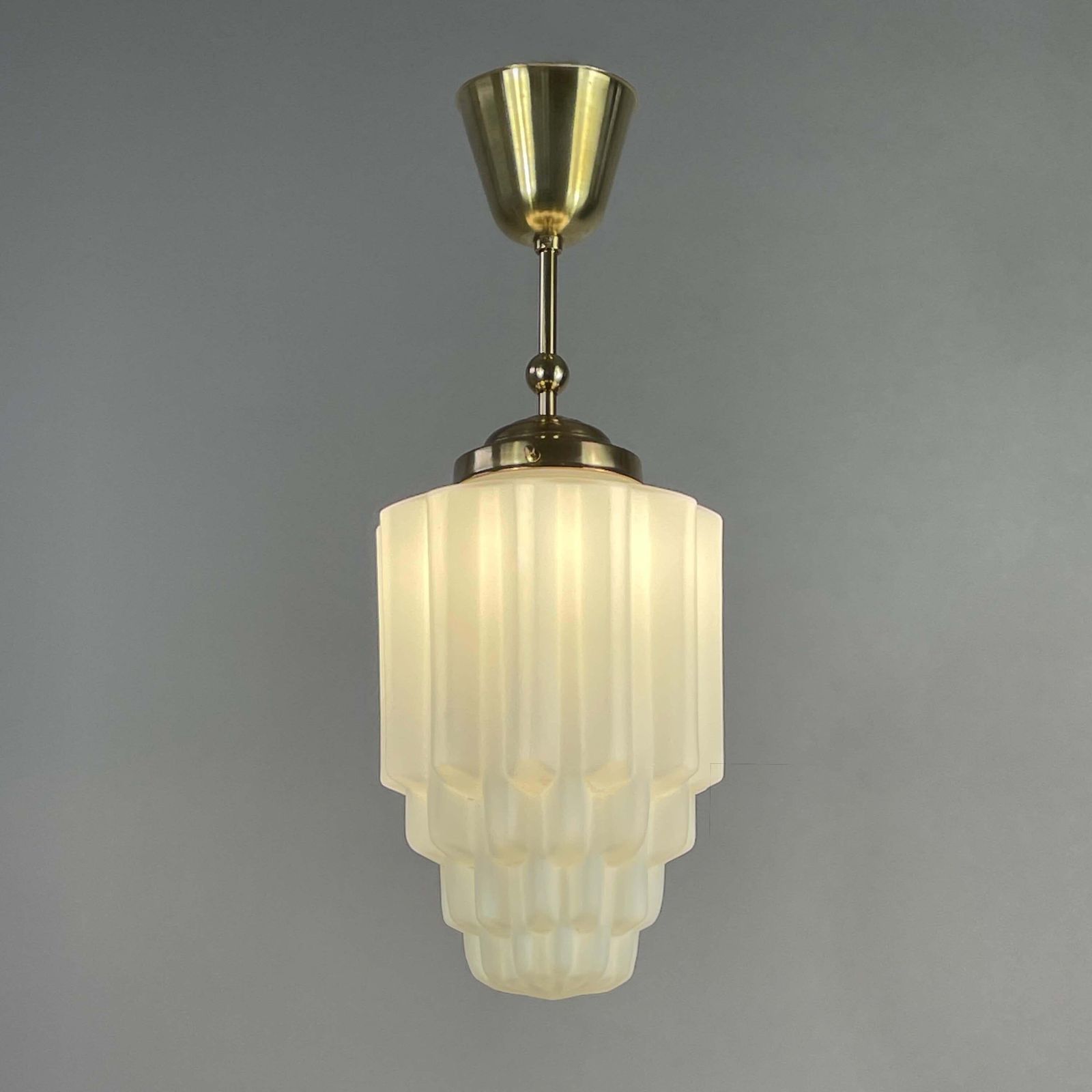 1037.0 Art Deco White Opaline Glass & Brass Skyscraper Pendant, France 1930s photo