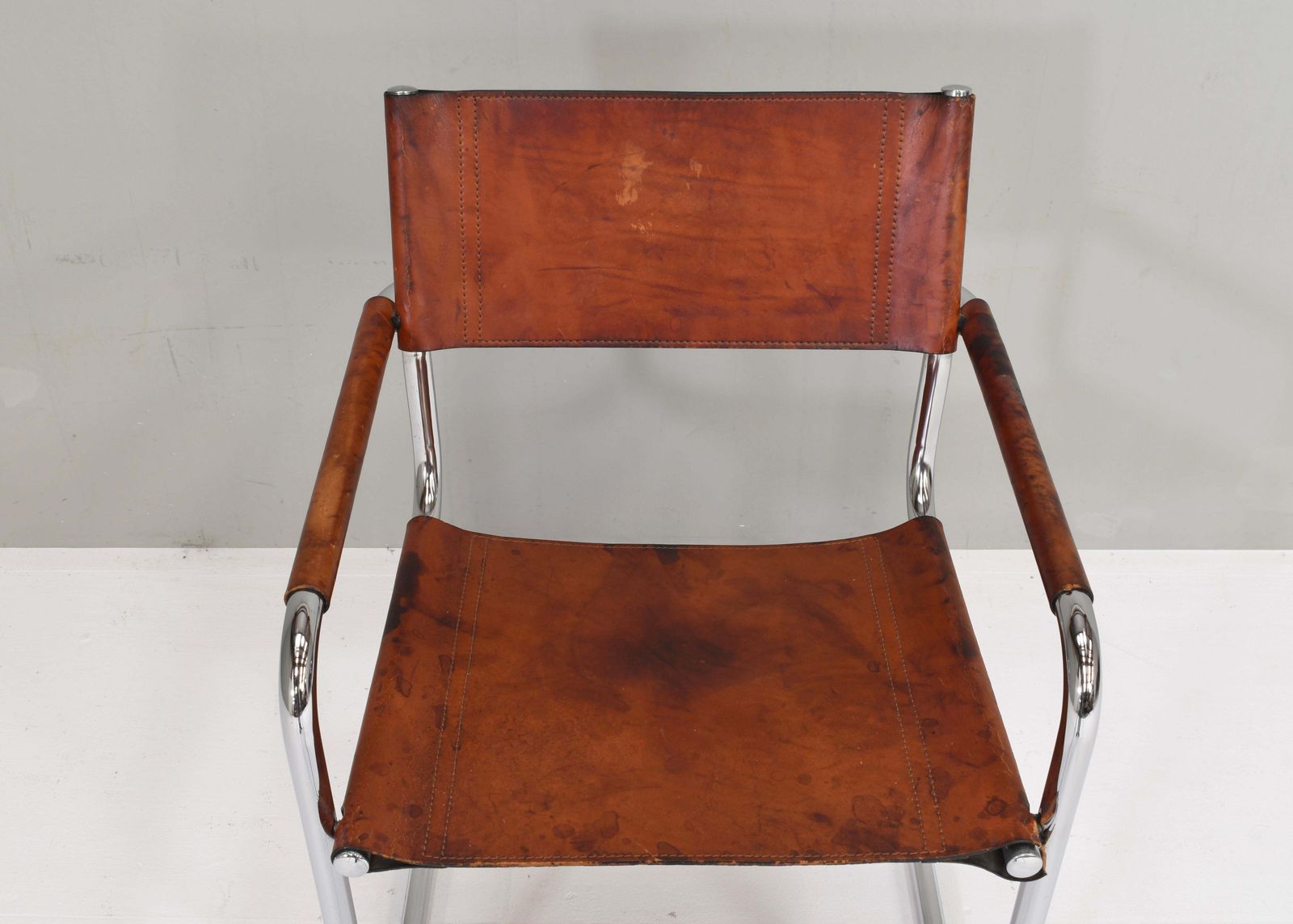 photo for sale Mart Stam S34 Dining Armchair In Cognac Saddle Leather, 1970s