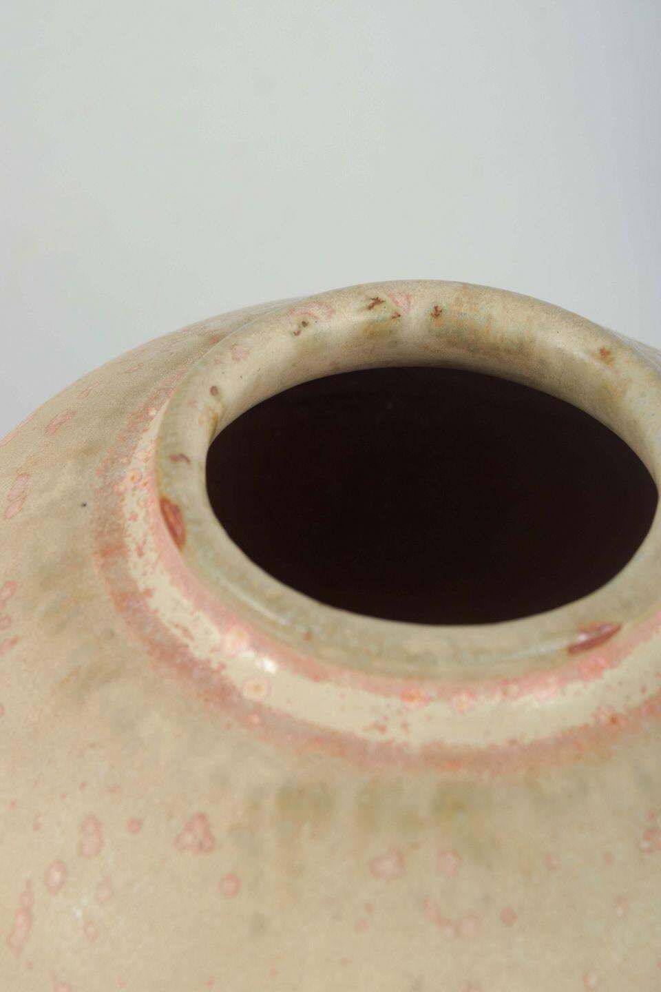 Royal Copenhagen. Spherical Stoneware Vase In Pink, White, And Beige Tones. photo for sale