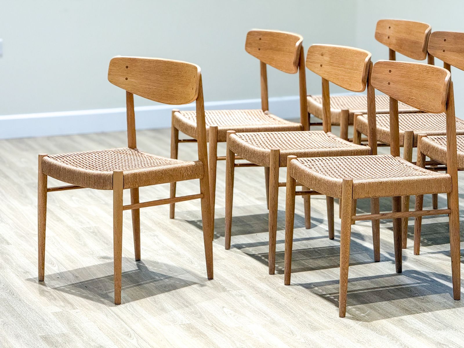 Set Of Eight Oak A.M Møbler Model 501 Papercord Dining Chairs
