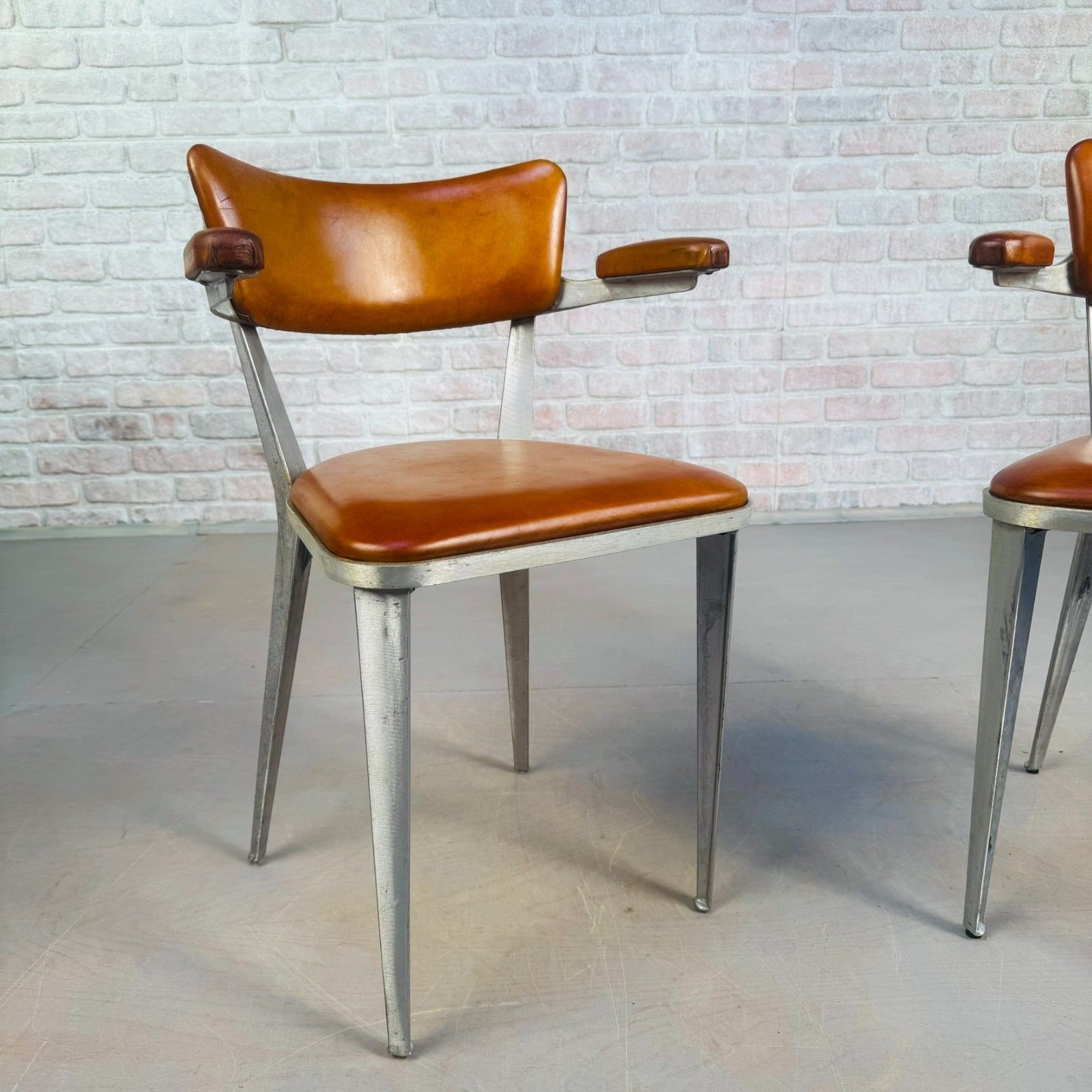 photo furniture Set Of 10 Ernest Race Ba3 Dining Chairs – Tan Leather Mid Century Modern Icons