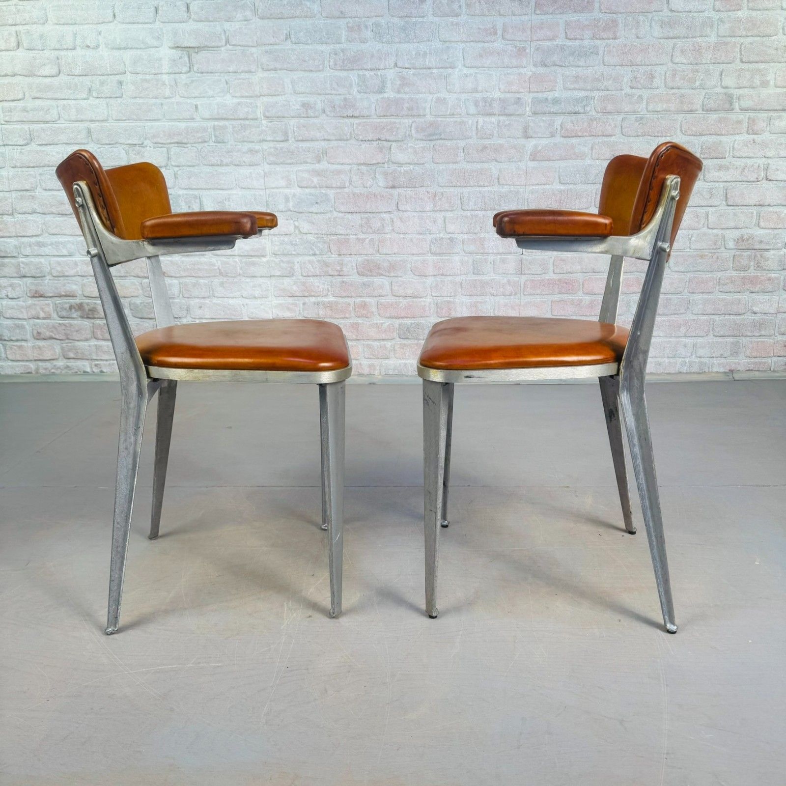 2420.0 Set Of 10 Ernest Race Ba3 Dining Chairs – Tan Leather Mid Century Modern Icons photo