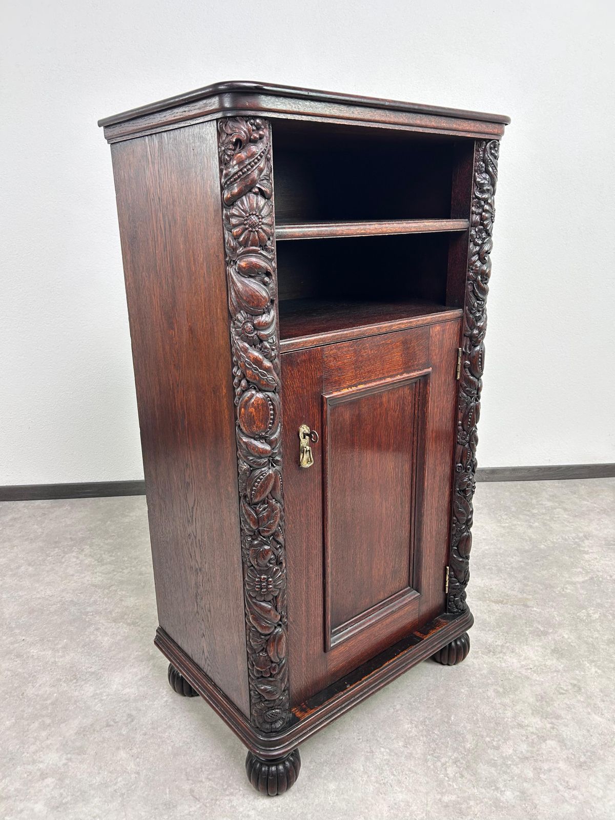 Art Nouveau Cabinet With A Shelf With Distinctive Floral Carvings photo furniture