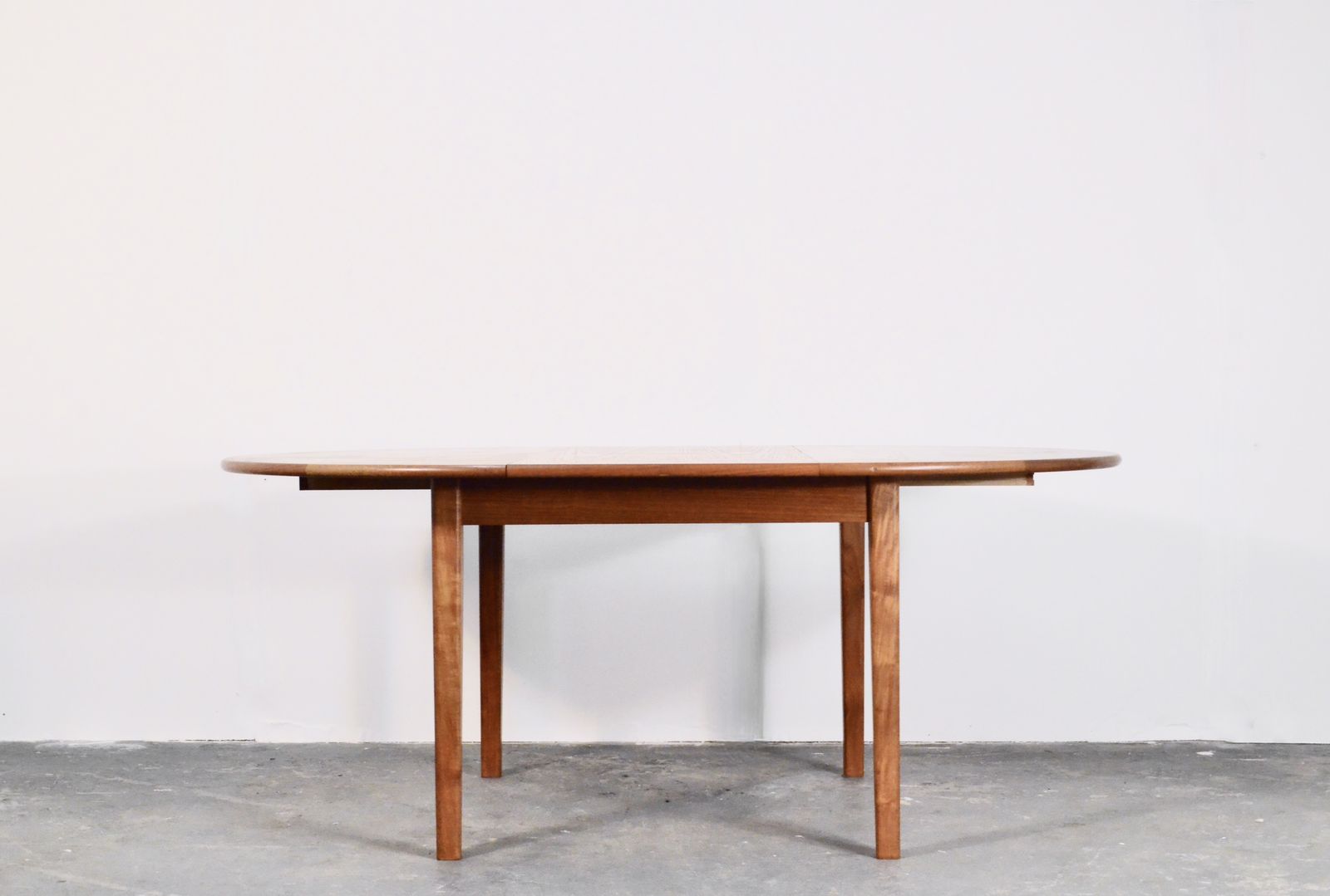 Midcentury Danish Teak Extending Round Table. photo furniture
