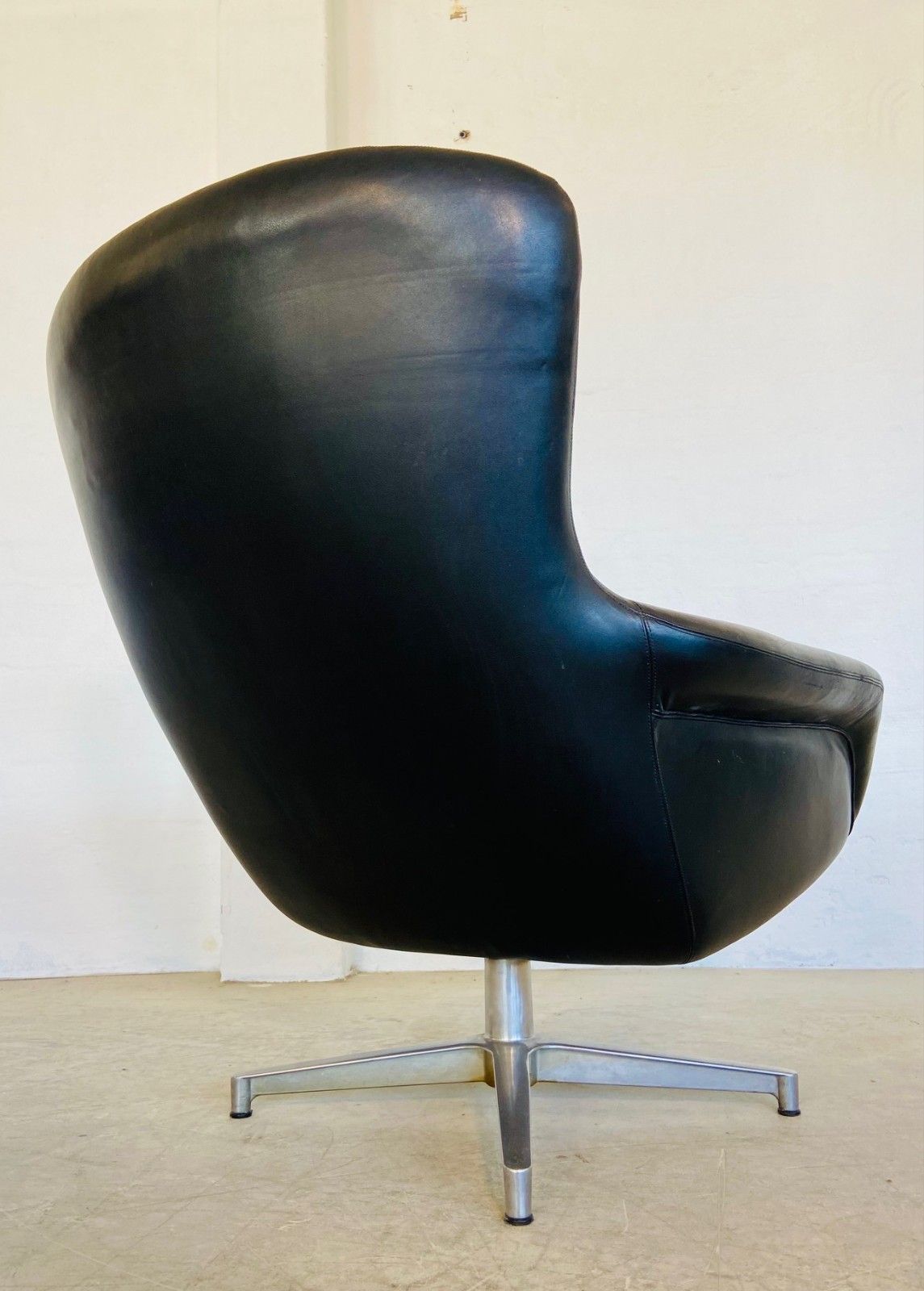 photo for sale Vintage Danish Mid Century Black Leather Swivel Chair Manufactured By Dux For Alf Svensson.
