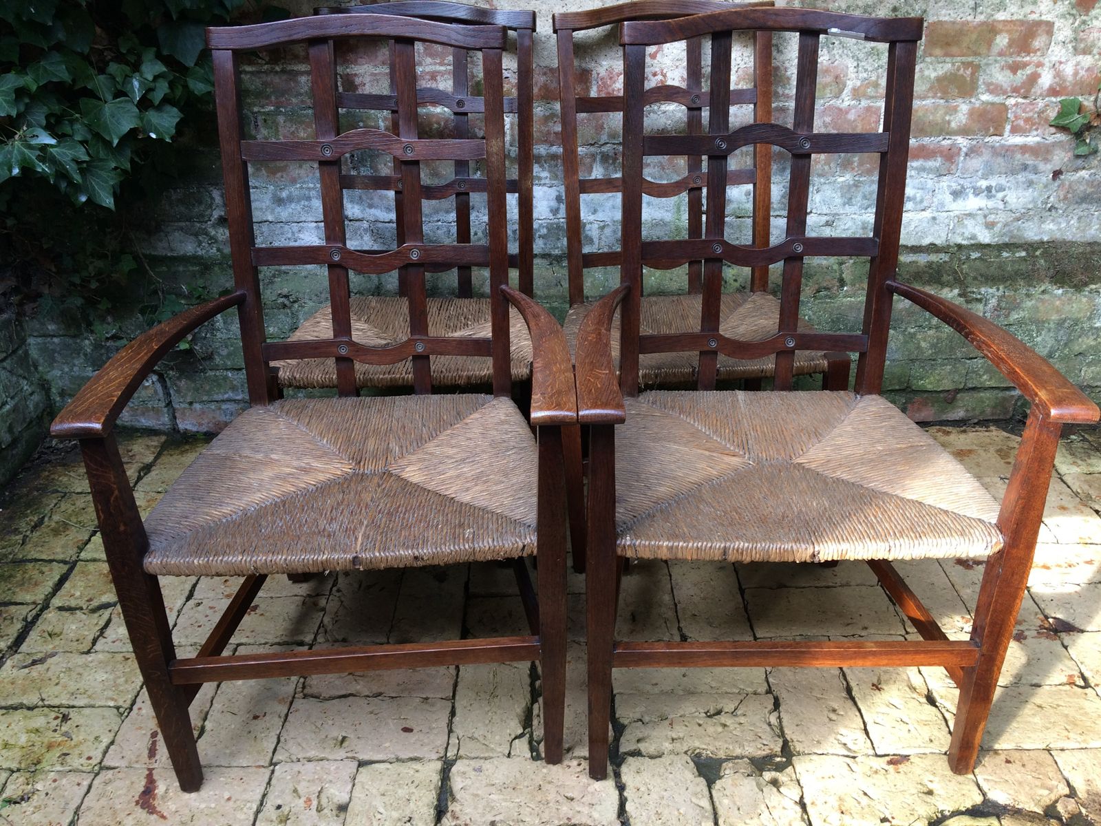 A Set Of Arts And Crafts Oak Cotswold School Chairs photo furniture