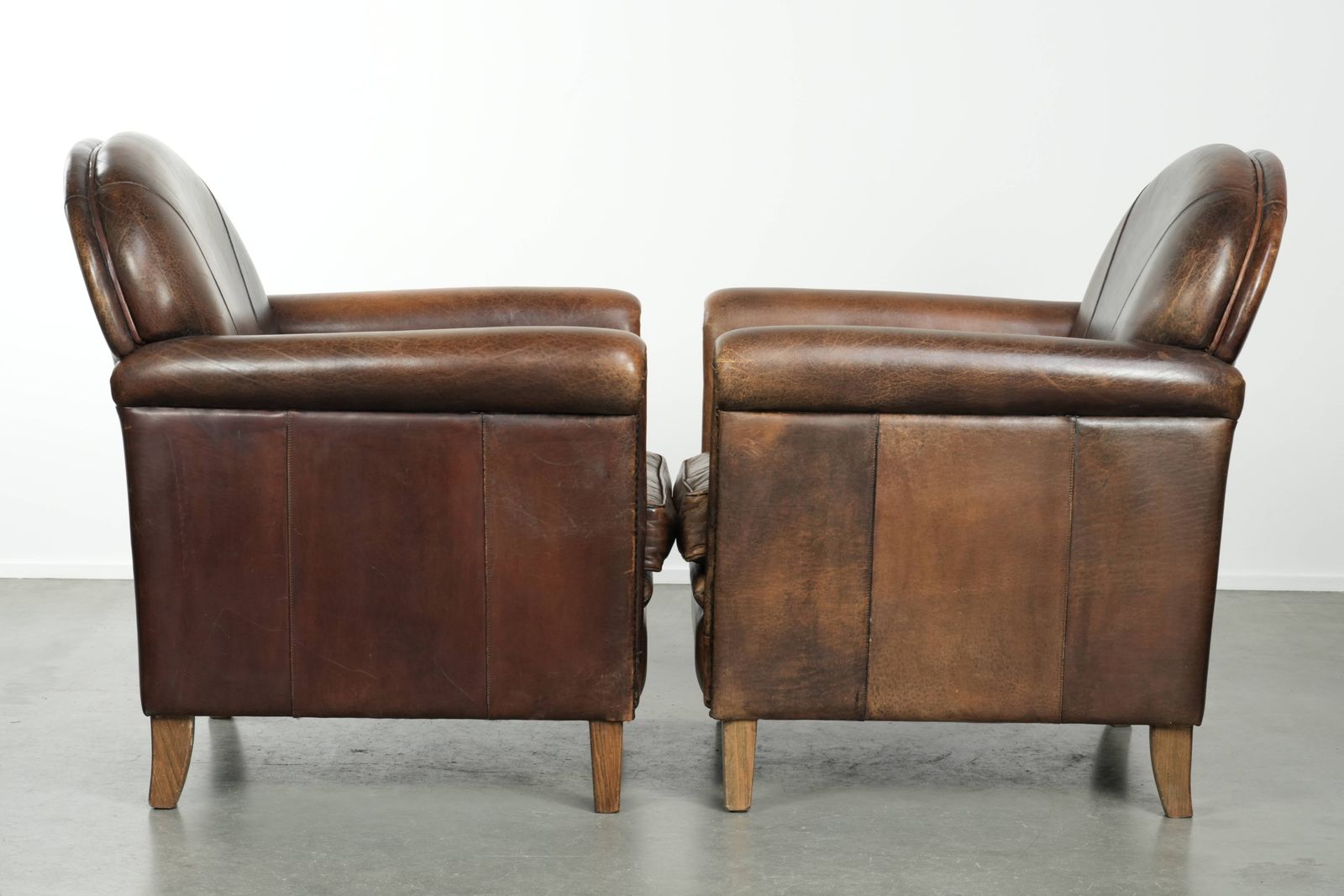Timeless, Luxurious, And Characterful Set Of Two Sheepskin Designer Armchairs With A Beautiful Patina photo furniture