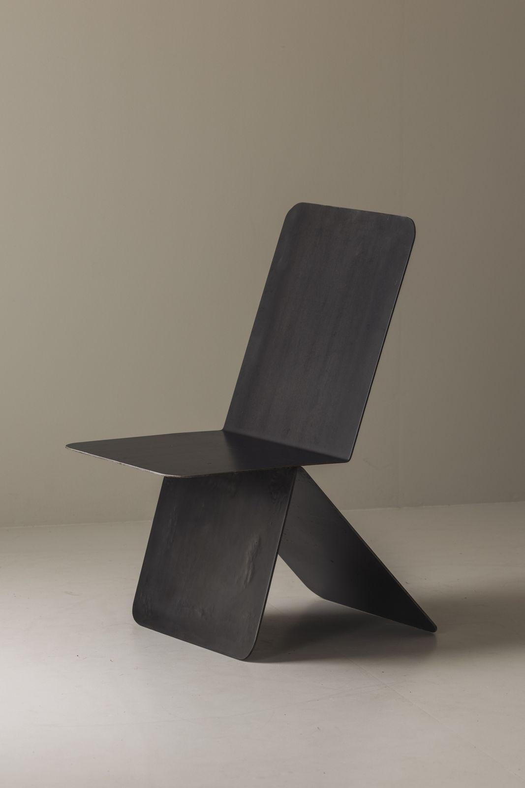 Striking Modernist Metal Chair From The 1980s, Executed In Folded Sheet Steel. photo Furniture