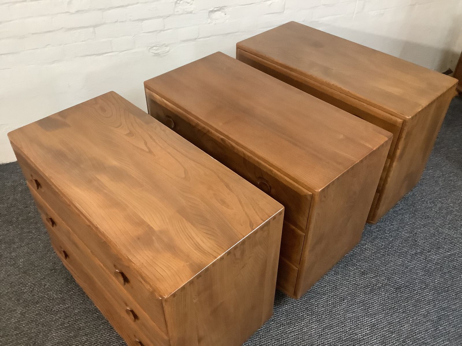 photo buy Matching Trio Of Ercol Windsor Chest Of Drawers.
