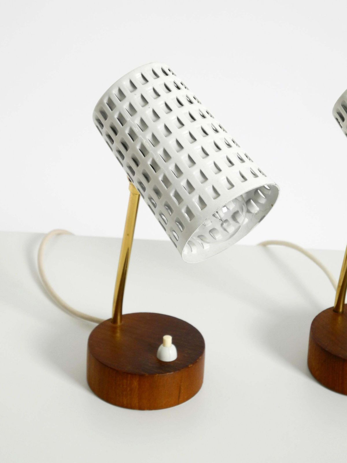 photo vinterior A Pair Of Beautiful Mid Century Modern Bedside Lamps With Perforated Metal Shade