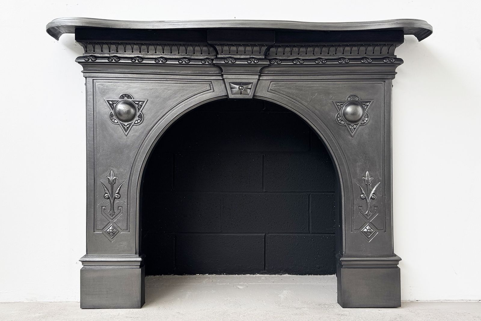 19th Century Victorian Arched Cast Iron Fireplace Surround photo for sale