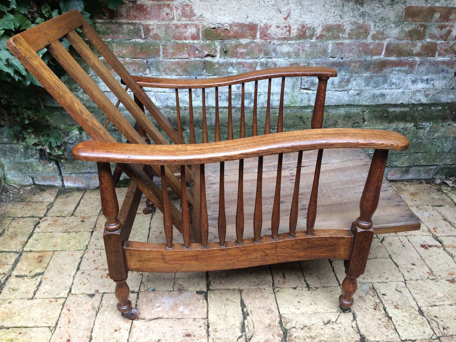 Arts And Crafts Oak Reclining Armchair By Wylie And Lochhead. photo 820.0