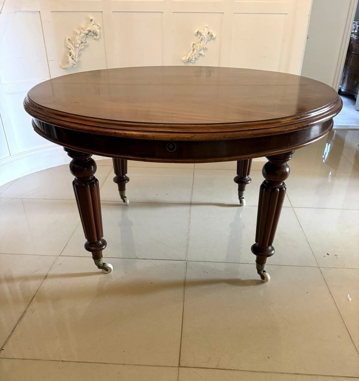 Antique 19th Century Mahogany Extending Dining Table, Wind Out Oval On Castors photo vintage