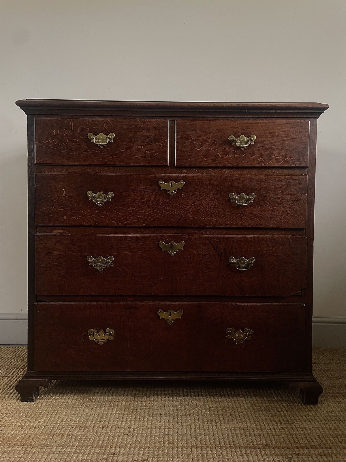 An Antique Oak Chest Of Drawers