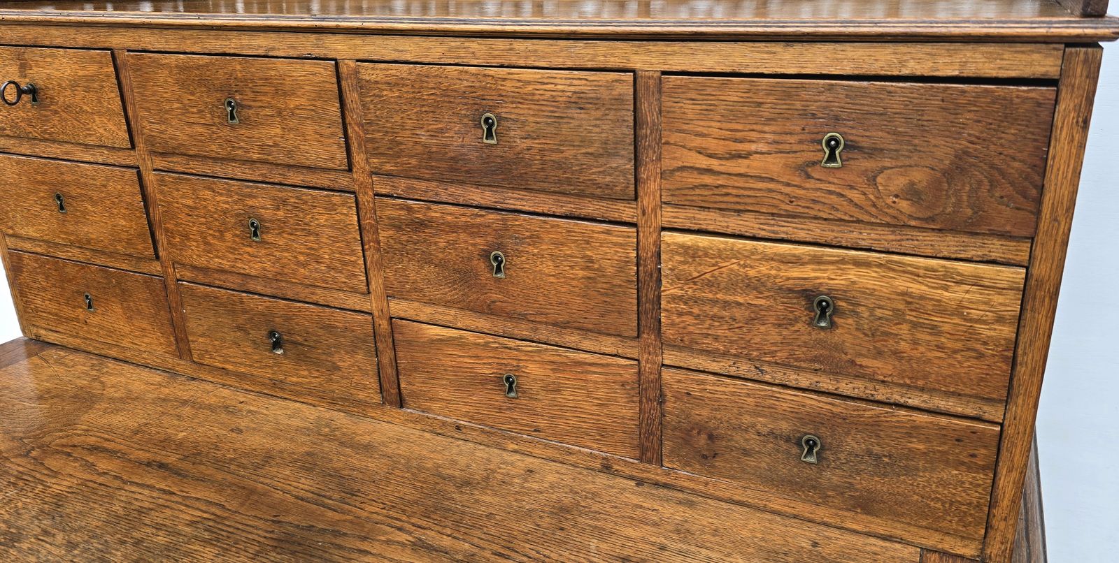 photo buy Antique French Oak Notaire's Desk With Bank Of Lockable Drawers & Carved Fretwork.