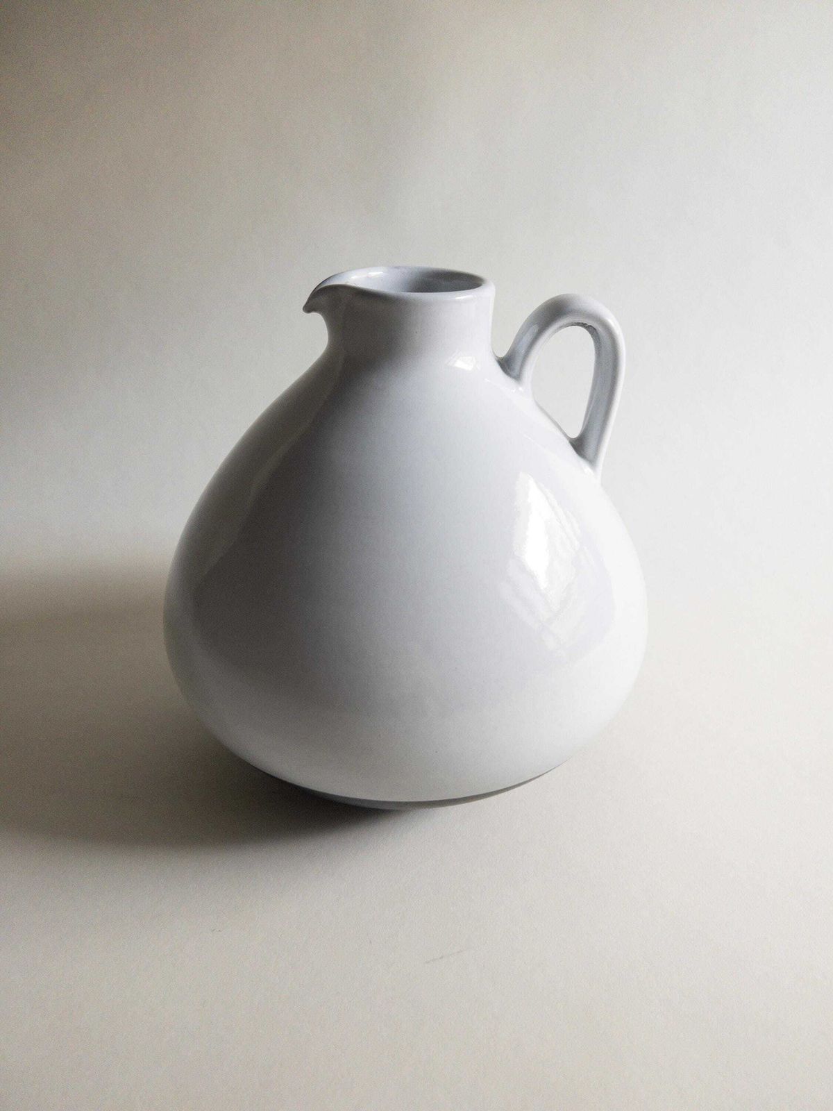 photo furniture Swiss Studio Pottery Vase: Minimal White Ceramic With Handle